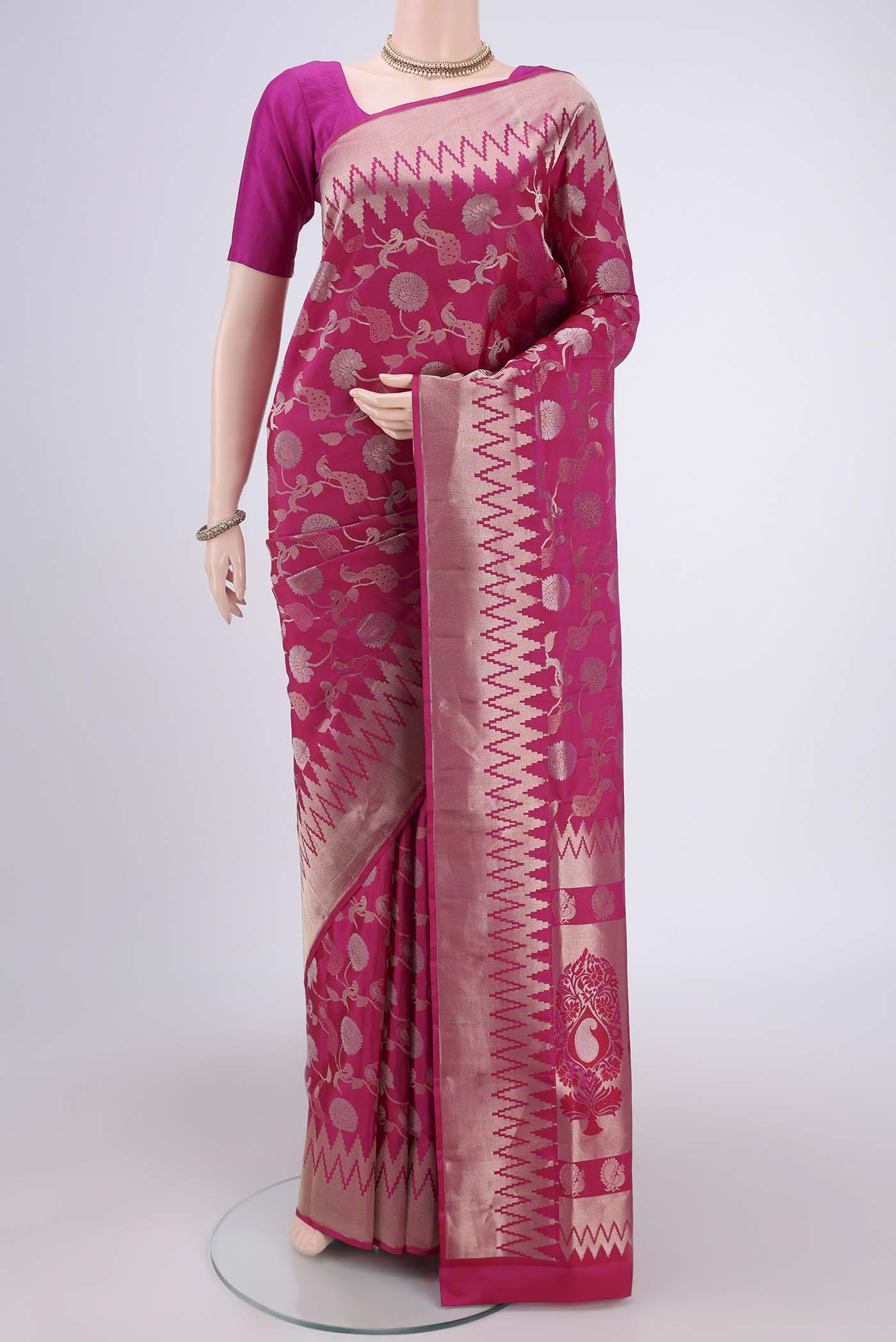 Orange with Pink Dual Tone Soft Silk Saree with Zari Brocade on the body and Zari Border.  displayed on a mannequin