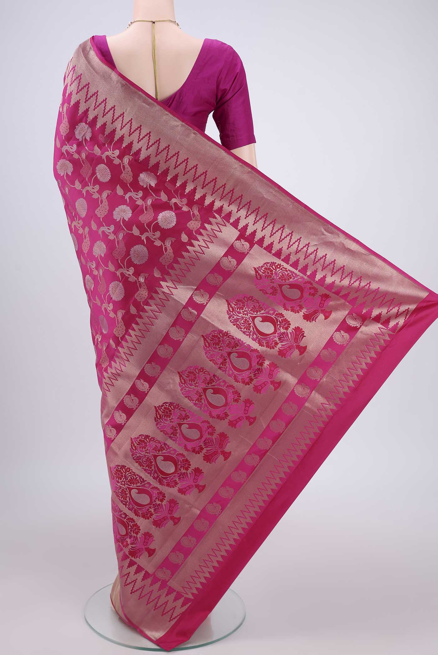 Flat view of Orange with Pink Dual Tone Soft Silk Saree with Zari Brocade on the body and Zari Border. 
