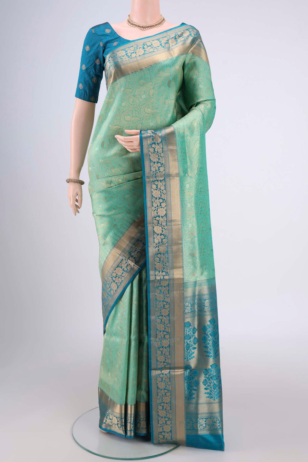 Orange with Pink Dual Tone Soft Silk Saree with Zari Brocade on the body and Zari Border.  displayed on a mannequin