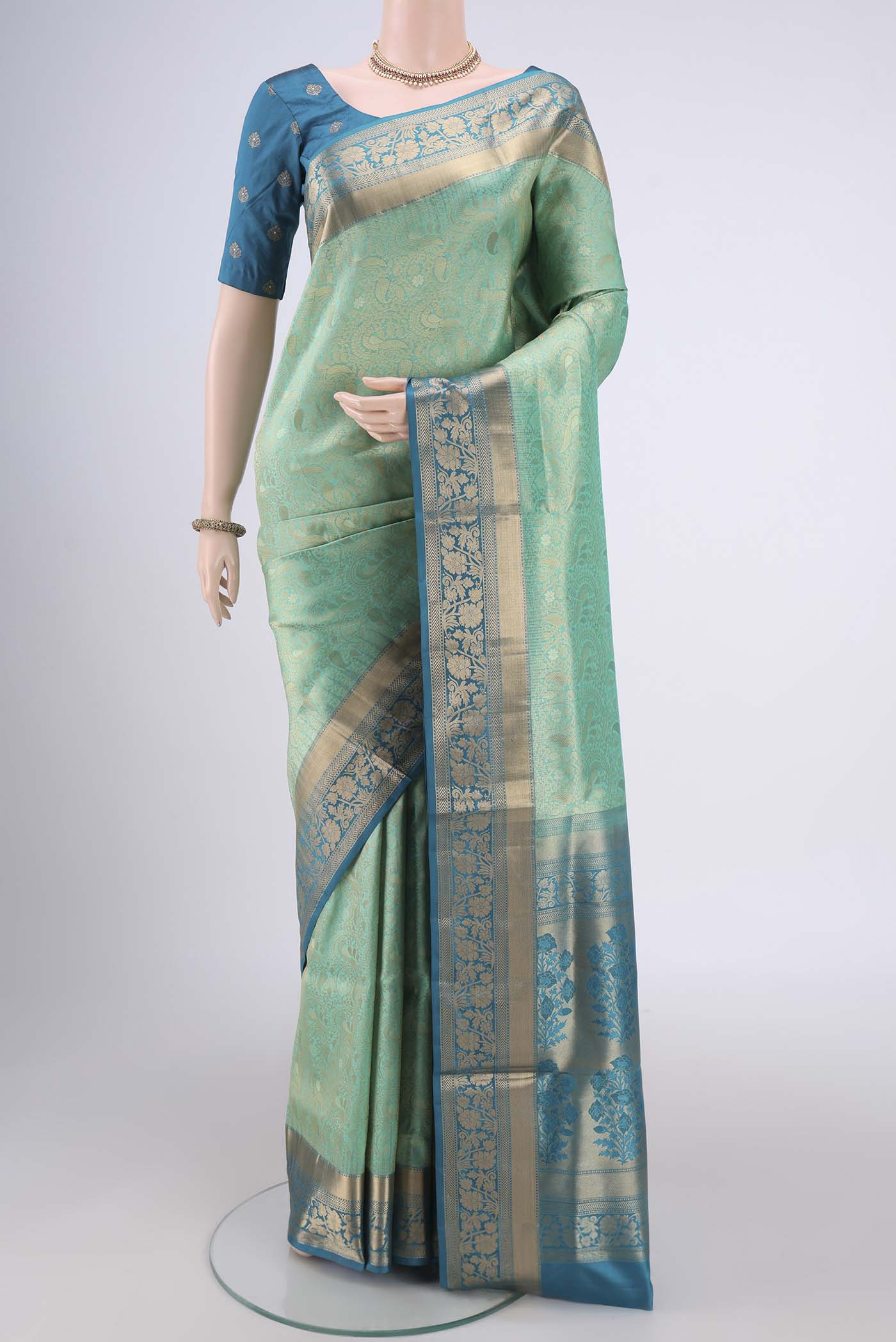 Orange with Pink Dual Tone Soft Silk Saree with Zari Brocade on the body and Zari Border.  displayed on a mannequin