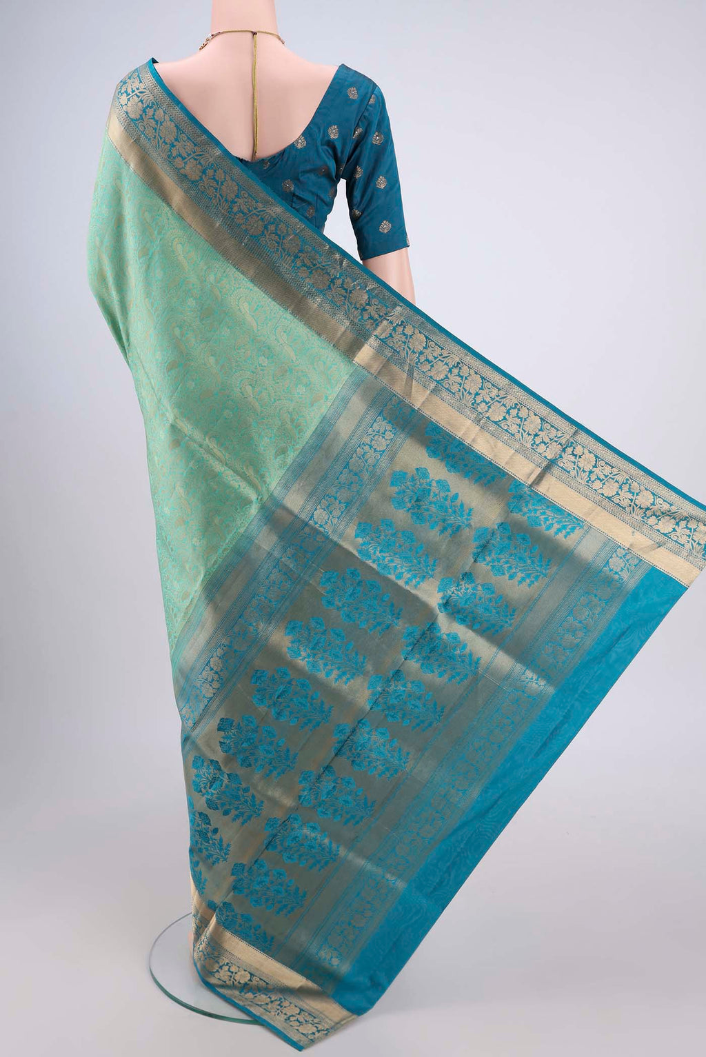 Flat view of Orange with Pink Dual Tone Soft Silk Saree with Zari Brocade on the body and Zari Border. 