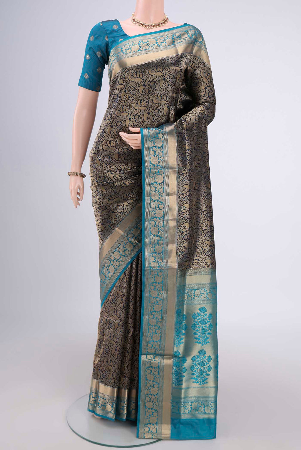 Orange with Pink Dual Tone Soft Silk Saree with Zari Brocade on the body and Zari Border.  displayed on a mannequin