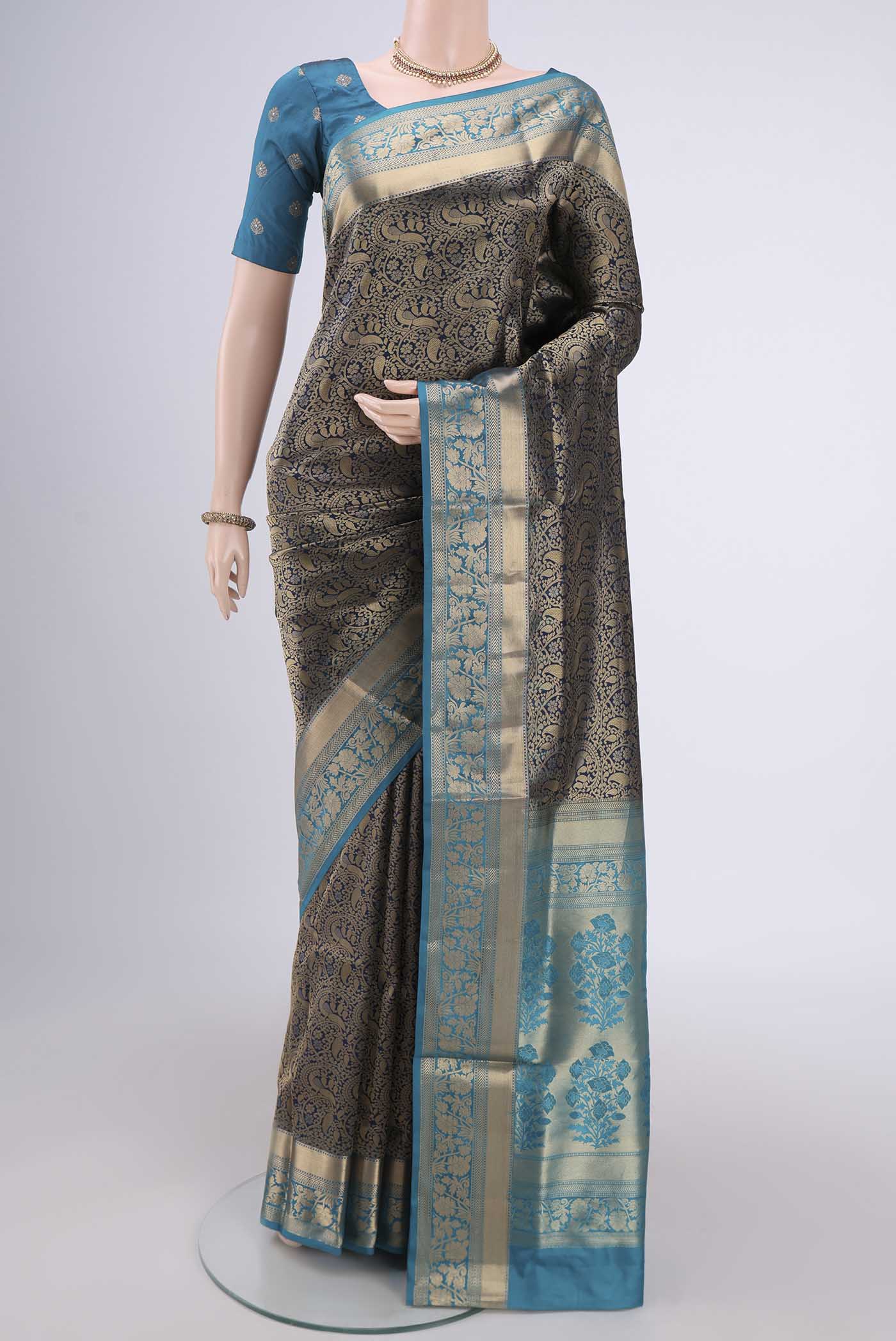Orange with Pink Dual Tone Soft Silk Saree with Zari Brocade on the body and Zari Border.  displayed on a mannequin