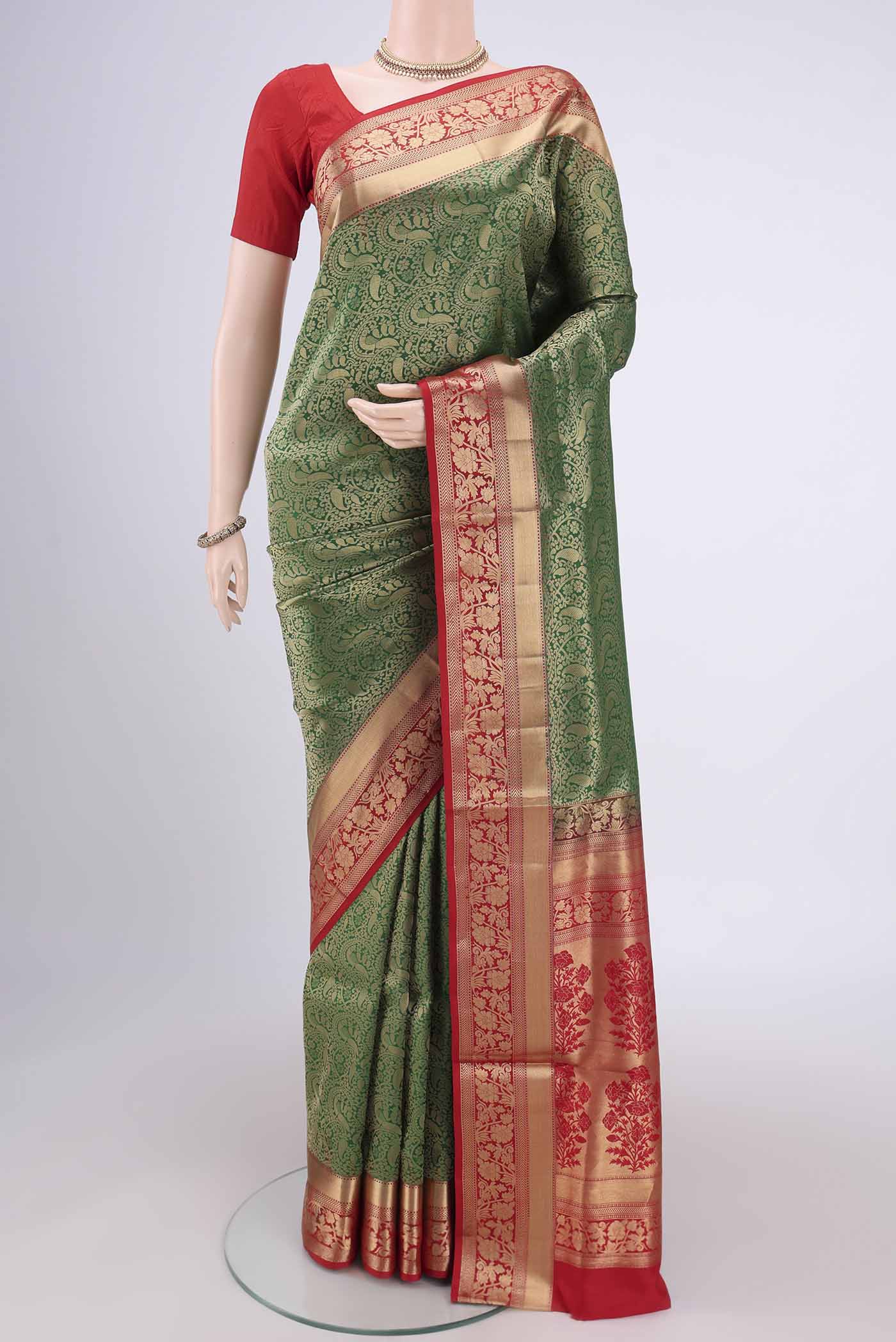 Orange with Pink Dual Tone Soft Silk Saree with Zari Brocade on the body and Zari Border.  displayed on a mannequin