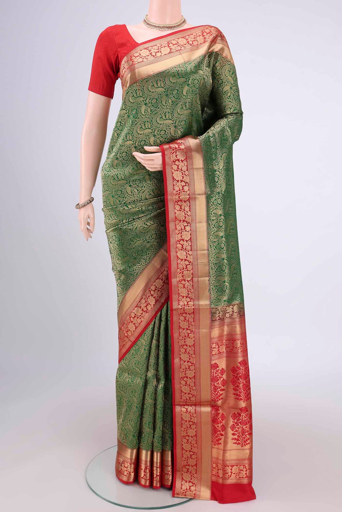Orange with Pink Dual Tone Soft Silk Saree with Zari Brocade on the body and Zari Border.  displayed on a mannequin