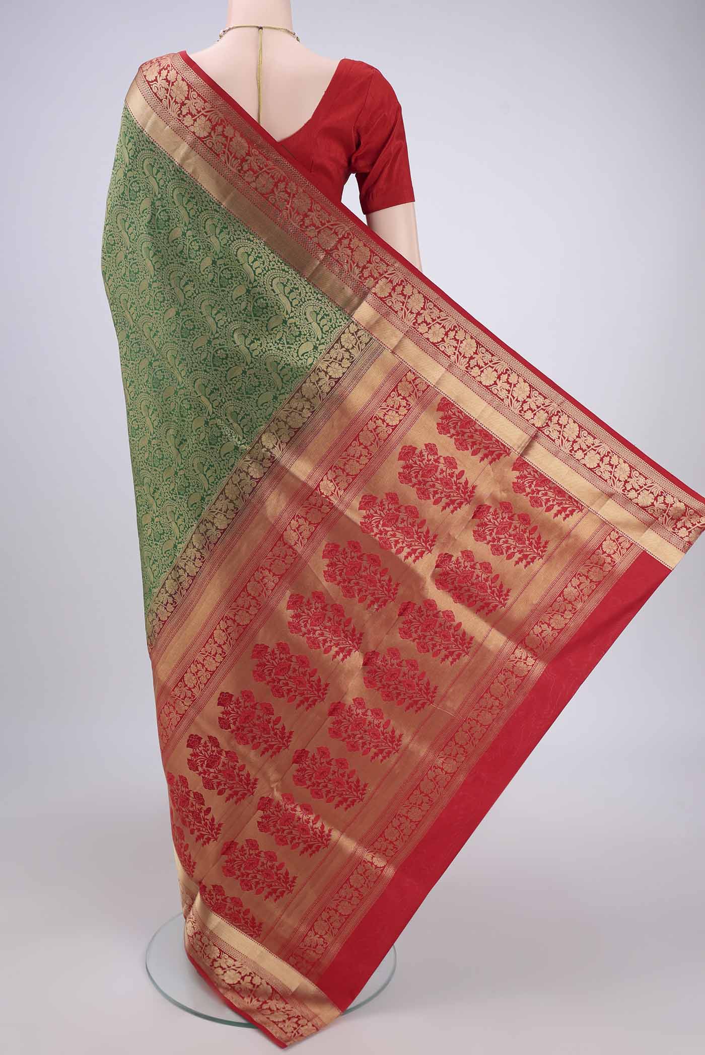 Flat view of Orange with Pink Dual Tone Soft Silk Saree with Zari Brocade on the body and Zari Border. 