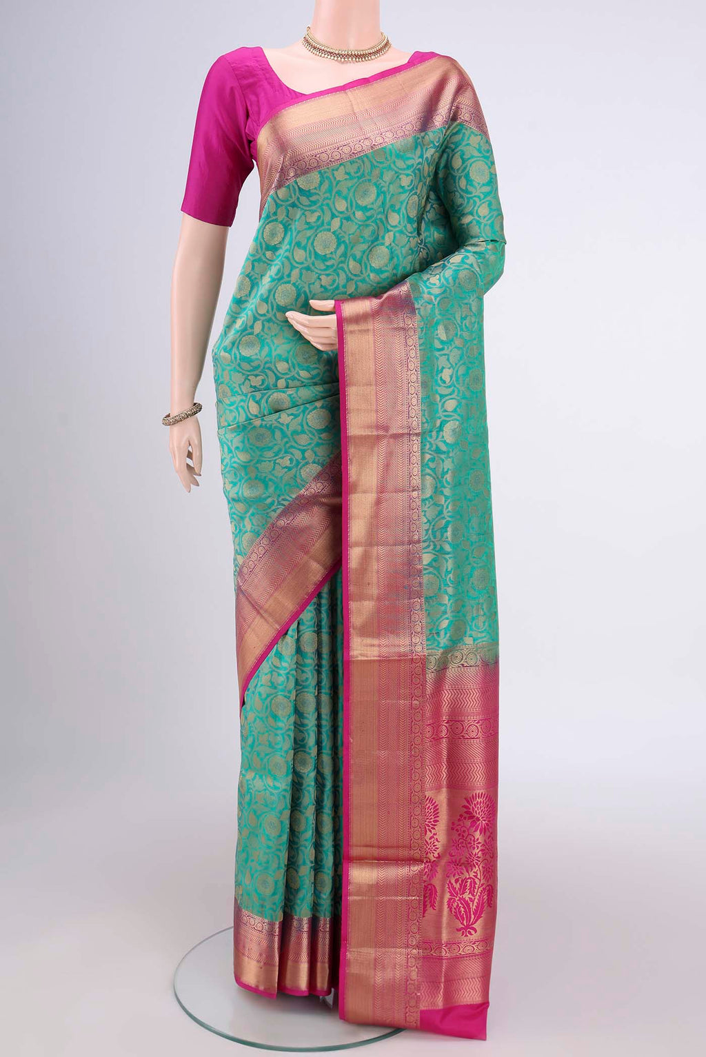 Orange with Pink Dual Tone Soft Silk Saree with Zari Brocade on the body and Zari Border.  displayed on a mannequin