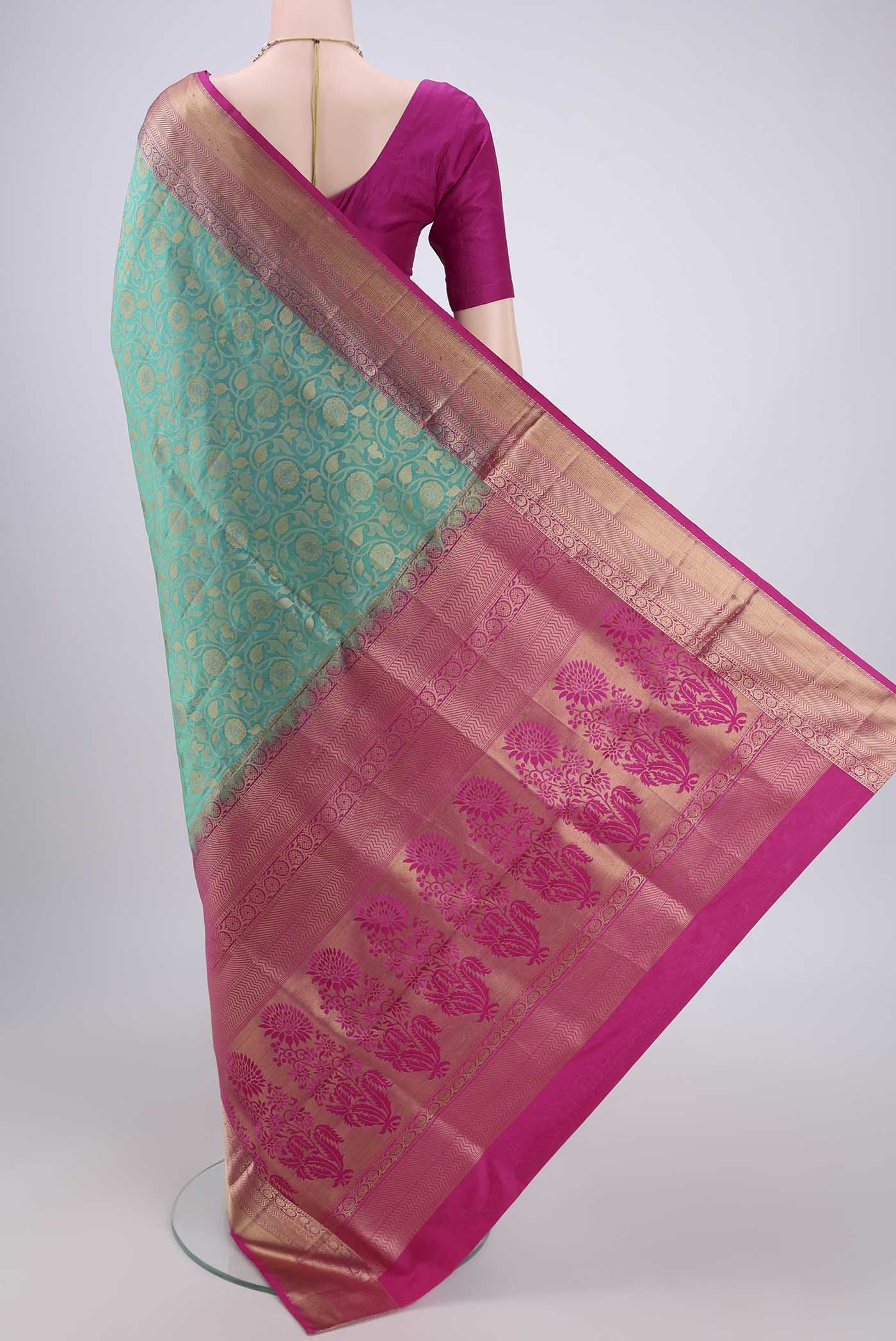 Flat view of Orange with Pink Dual Tone Soft Silk Saree with Zari Brocade on the body and Zari Border. 