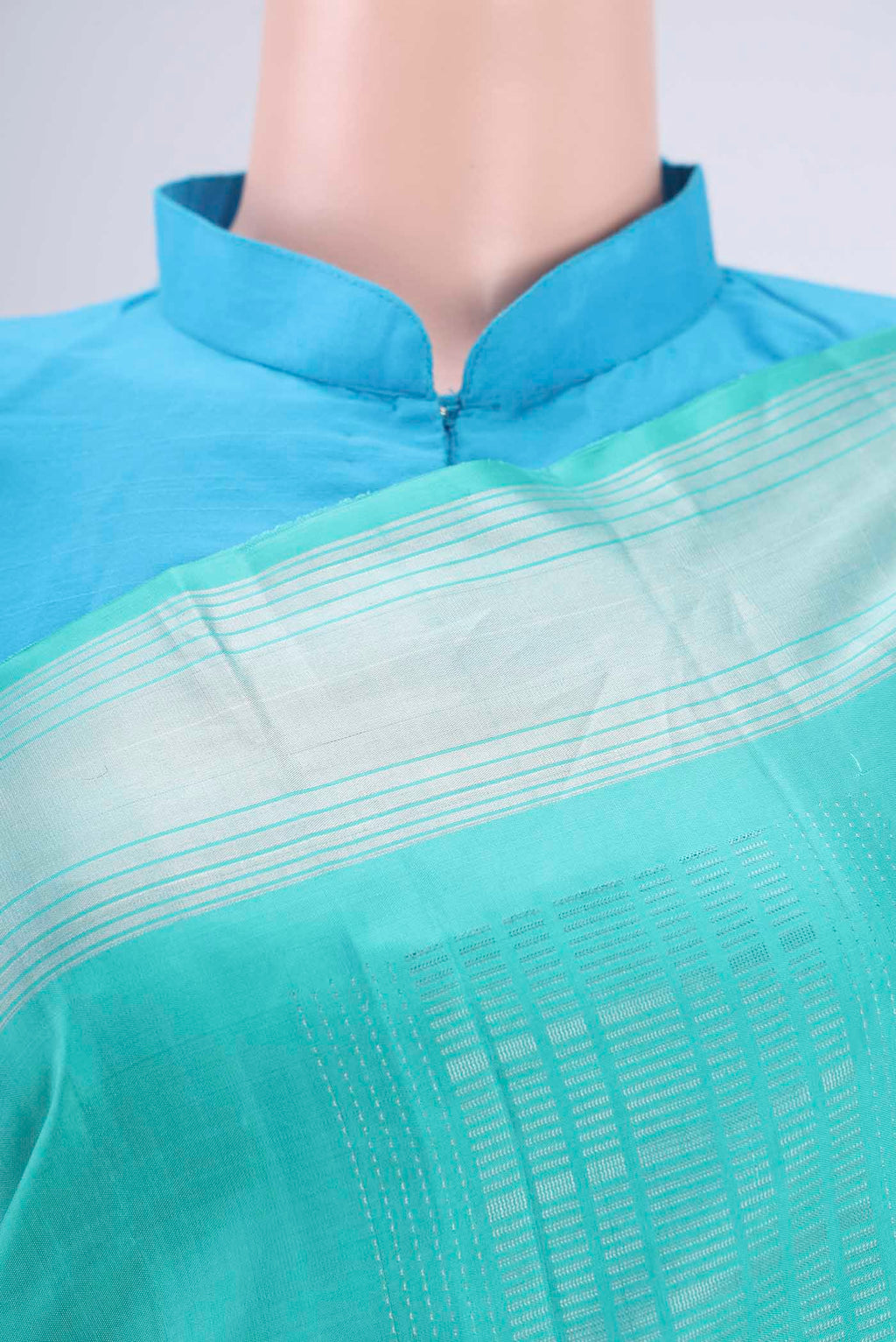 Border image of Turquoise Soft Silk Saree with Stripes on the body and Zari Border. 