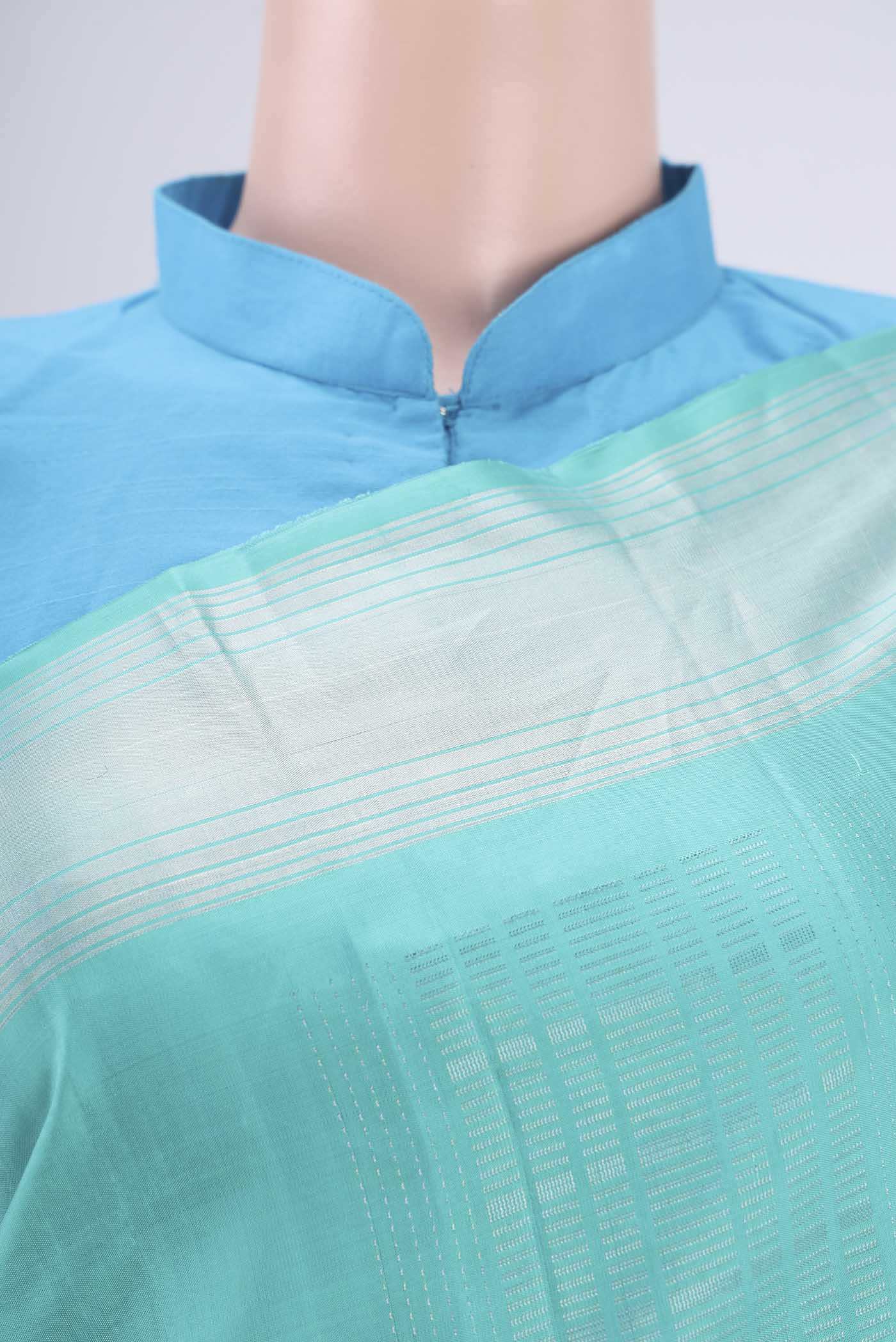 Border image of Turquoise Soft Silk Saree with Stripes on the body and Zari Border. 