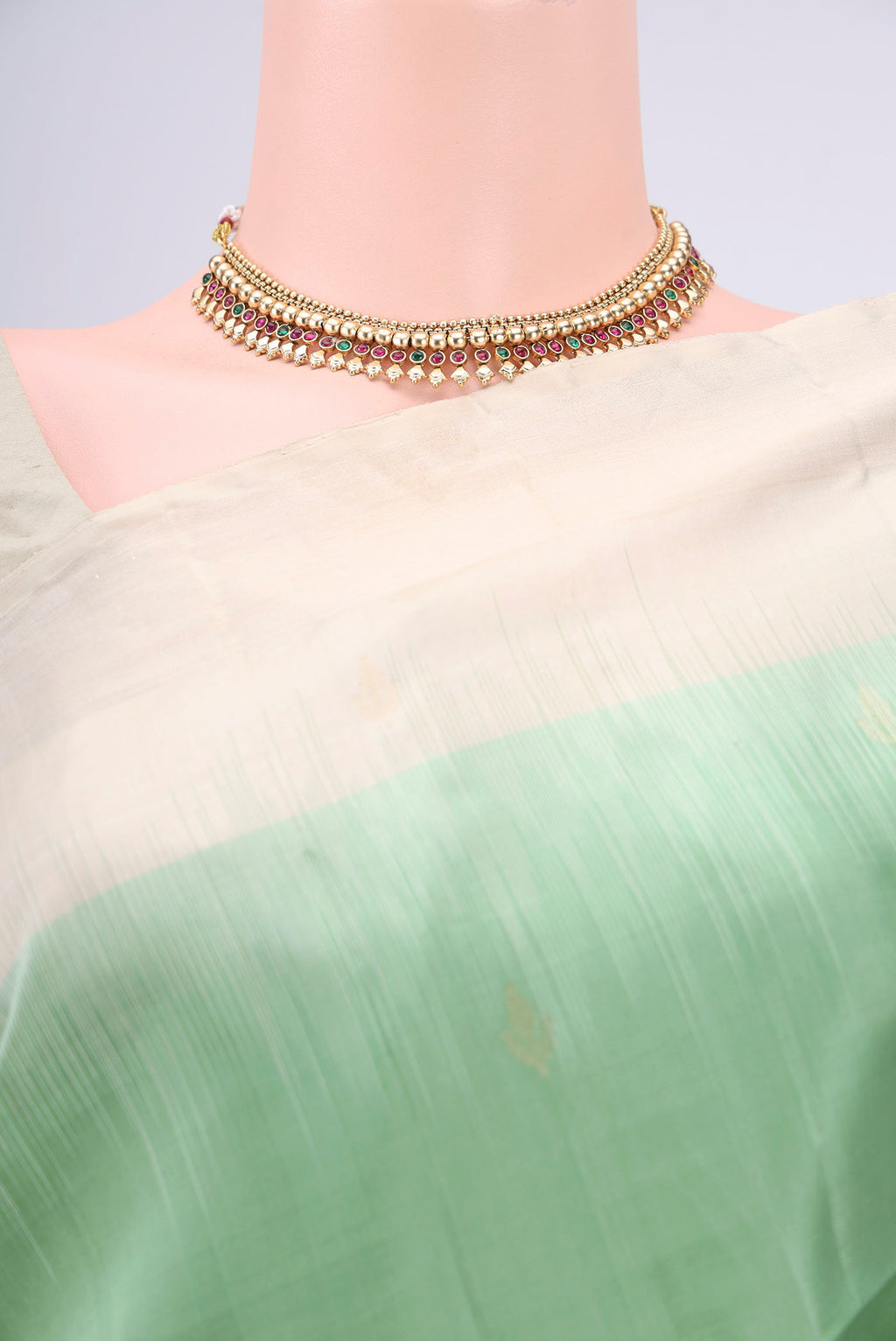 Border image of Light Green Soft Silk Saree with Zari Butta on the body and Zari Border. 