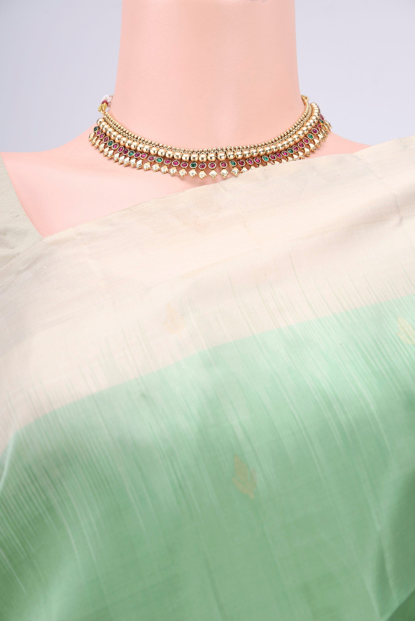 Border image of Light Green Soft Silk Saree with Zari Butta on the body and Zari Border. 