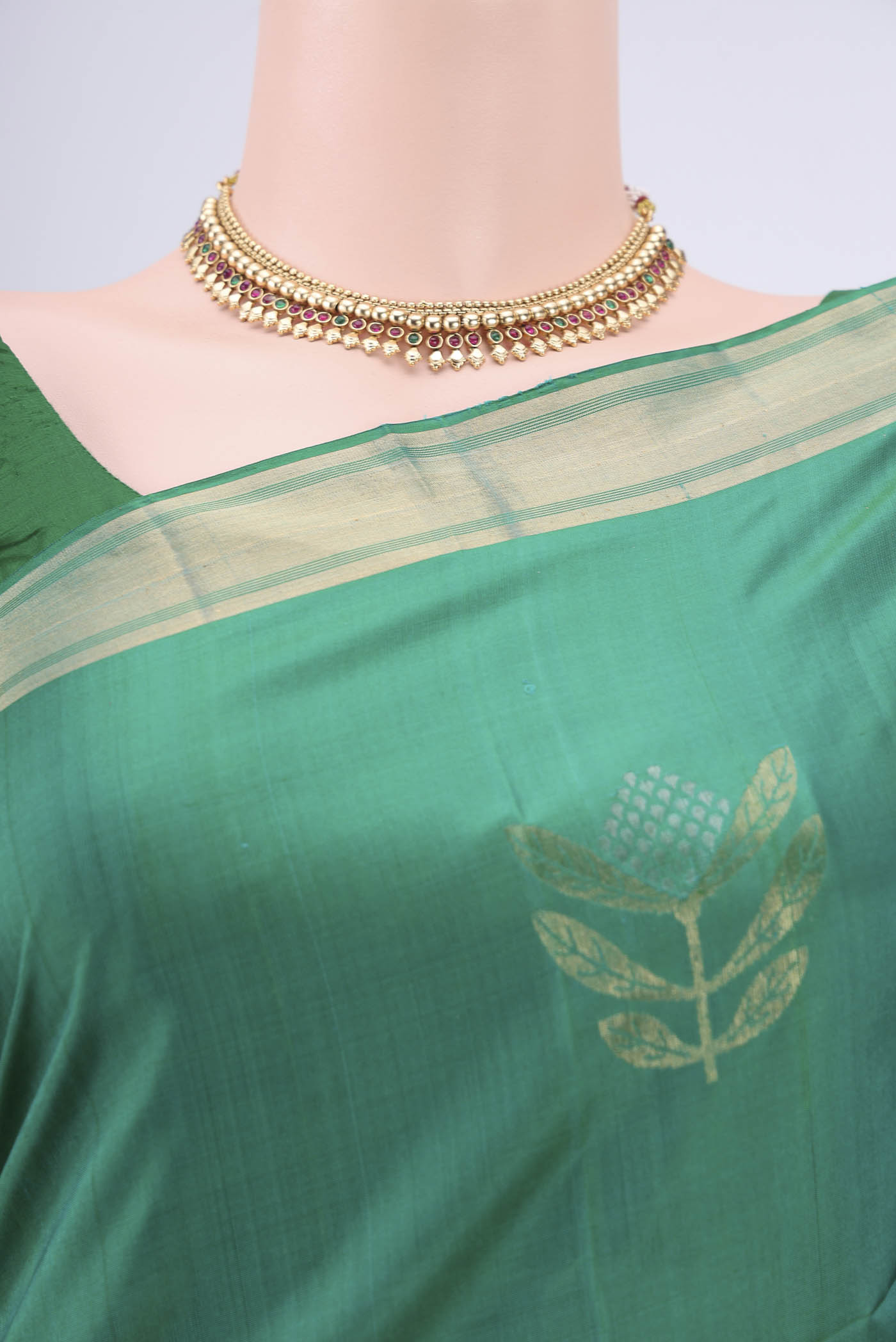 Border image of Green Dual Tone Baluchari Silk Saree with Zari Butta on the body and Zari Border. 