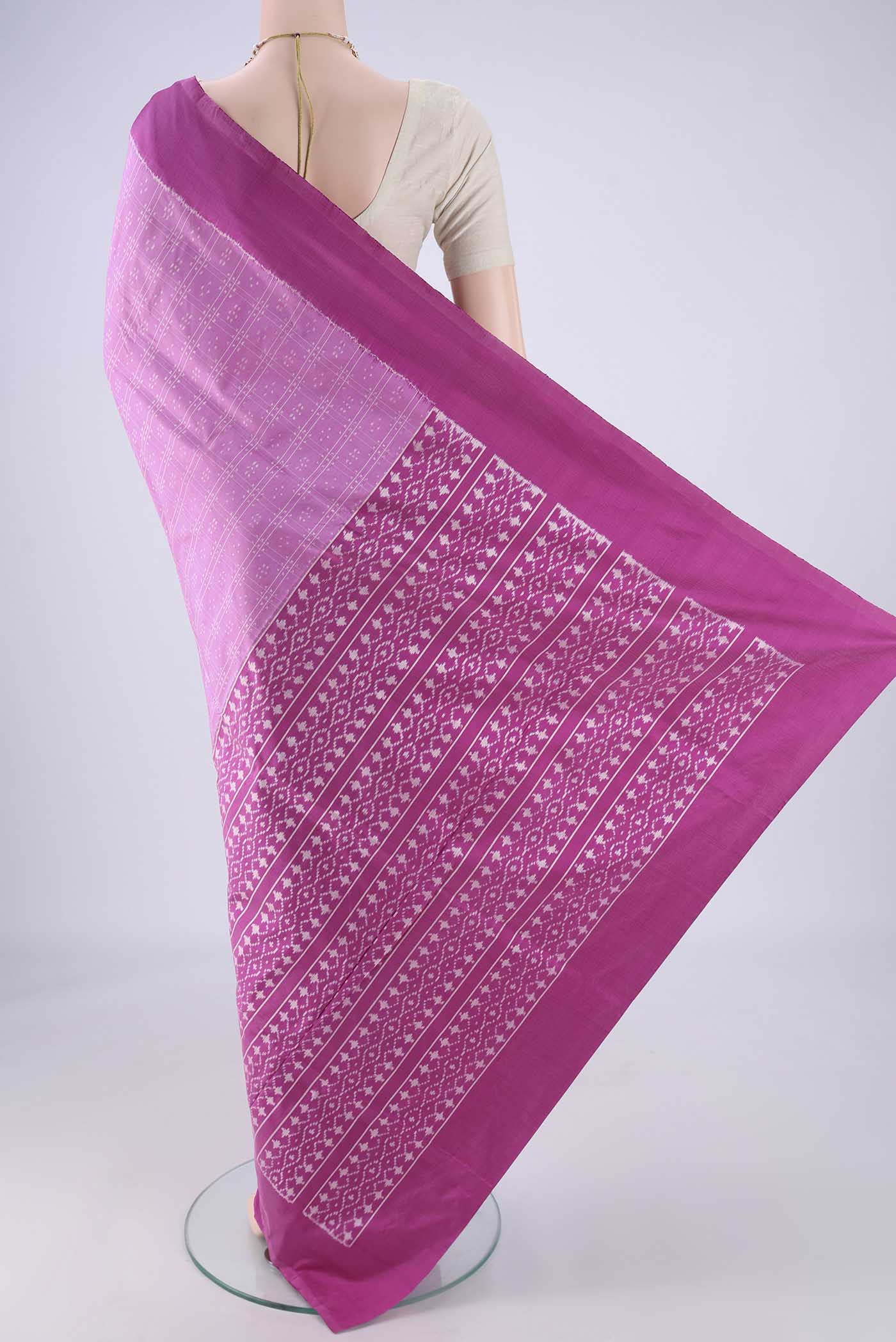 Flat view of Rose pink Pochampally Silk Saree with Checked design on the body and Plain Border. 