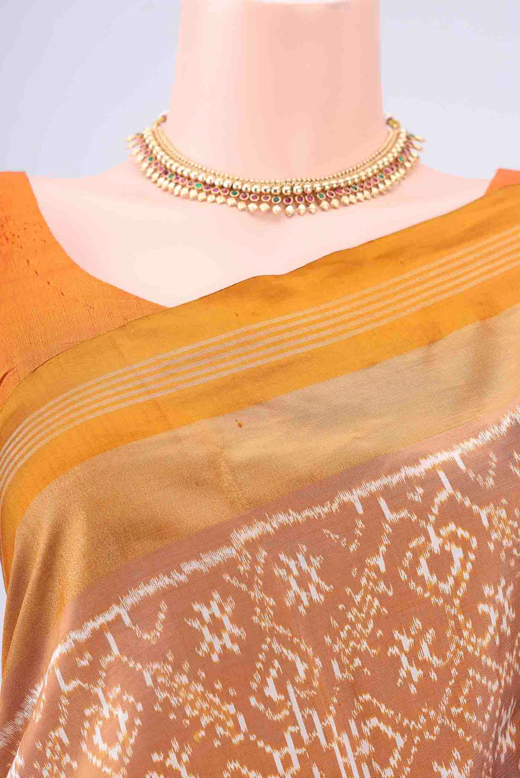 Border image of Sandal Pochampally Silk Saree with Checked design on the body and Zari Border. 