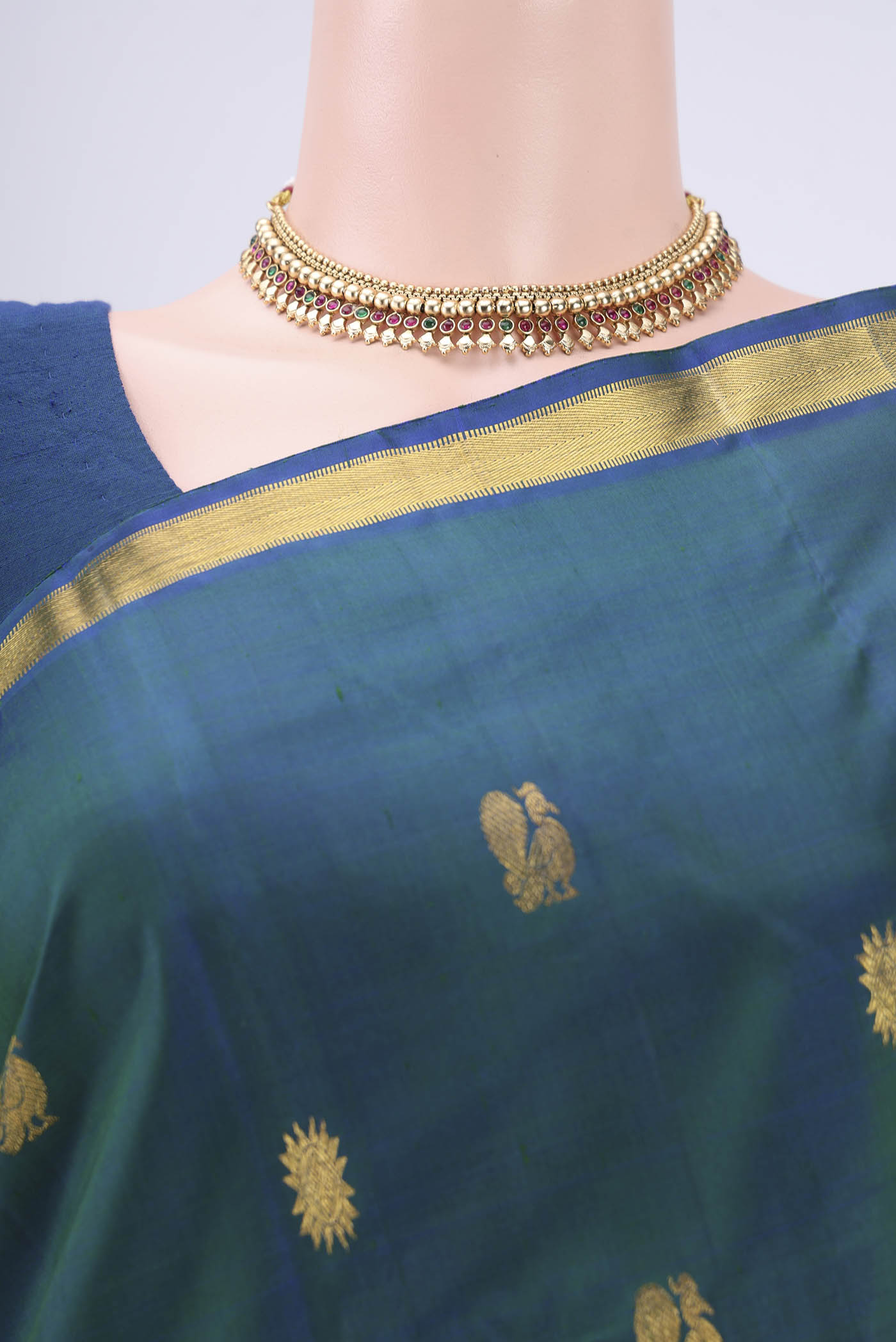 Border image of Turquoise Kanjivaram Silk Saree with Zari Butta on the body and Zari Border. 