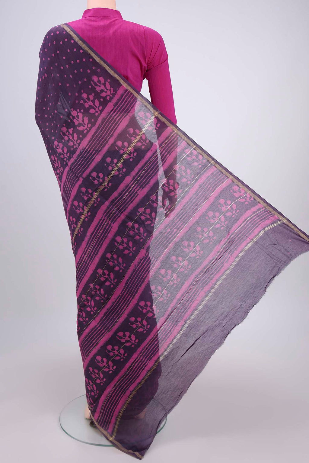 Flat view of Purple Chanderi Silk Saree with Batik Print on the body and Zari Border. 