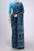 Navy Blue Chanderi Silk Saree with Batik Print on the body and Zari Border.  displayed on a mannequin
