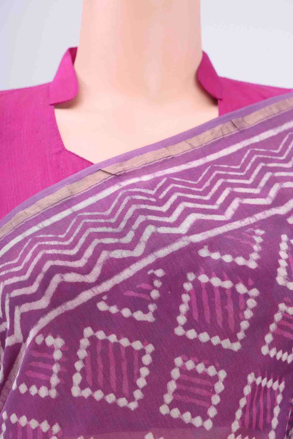 Border image of Violet Chanderi Silk Saree with Batik Print on the body and Zari Border. 