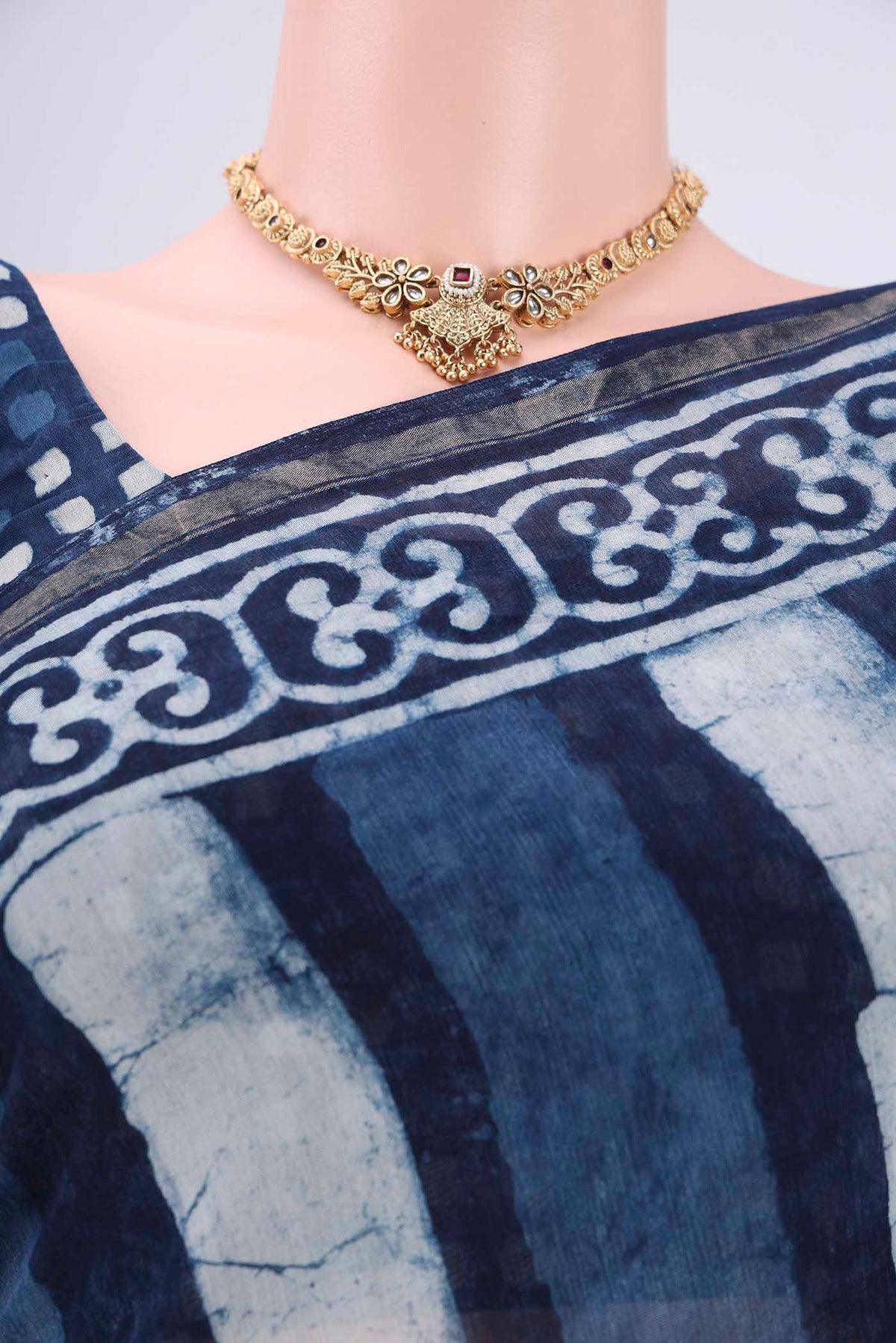Border image of Indigo Chanderi Silk Saree with Batik Print on the body and Thin Zari Line. 