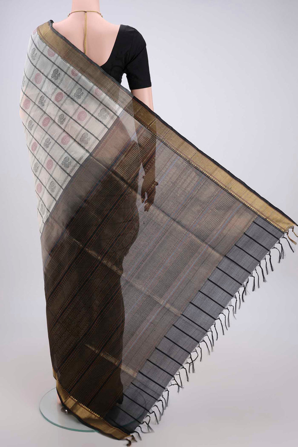 Flat view of Off White Coimbatore Silk Cotton Saree with Checked design on the body and Zari Border. 