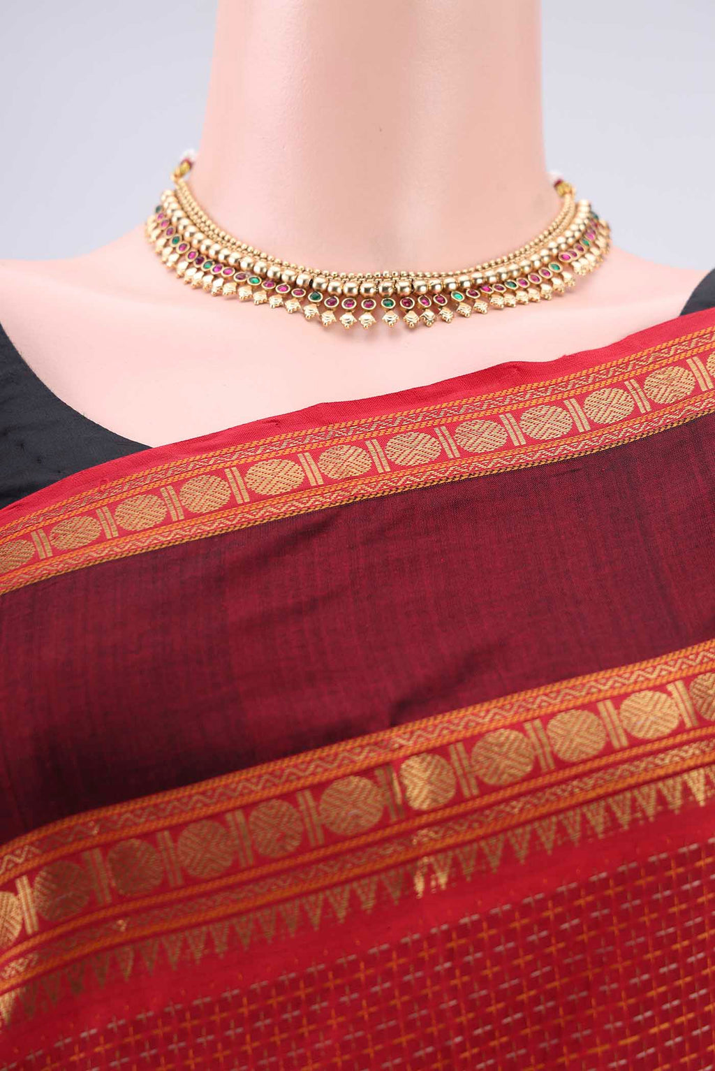 Border image of Red Coimbatore Silk Cotton Saree with Jacquard design on the body and Zari Border. 