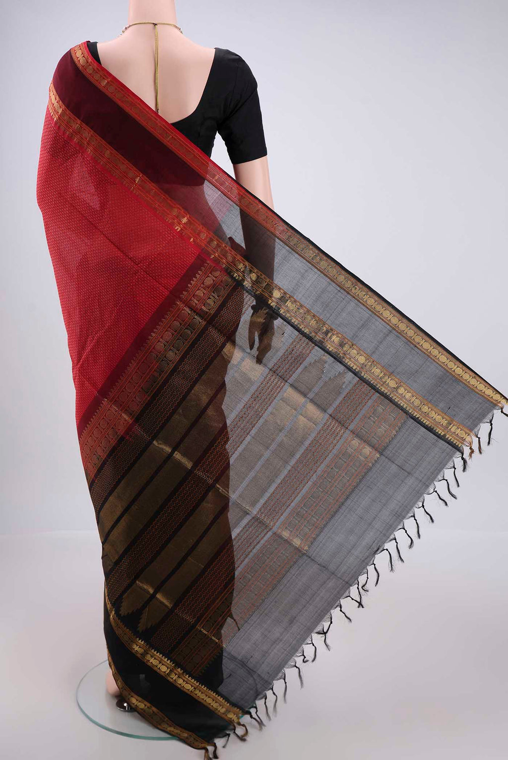 Flat view of Red Coimbatore Silk Cotton Saree with Jacquard design on the body and Zari Border. 