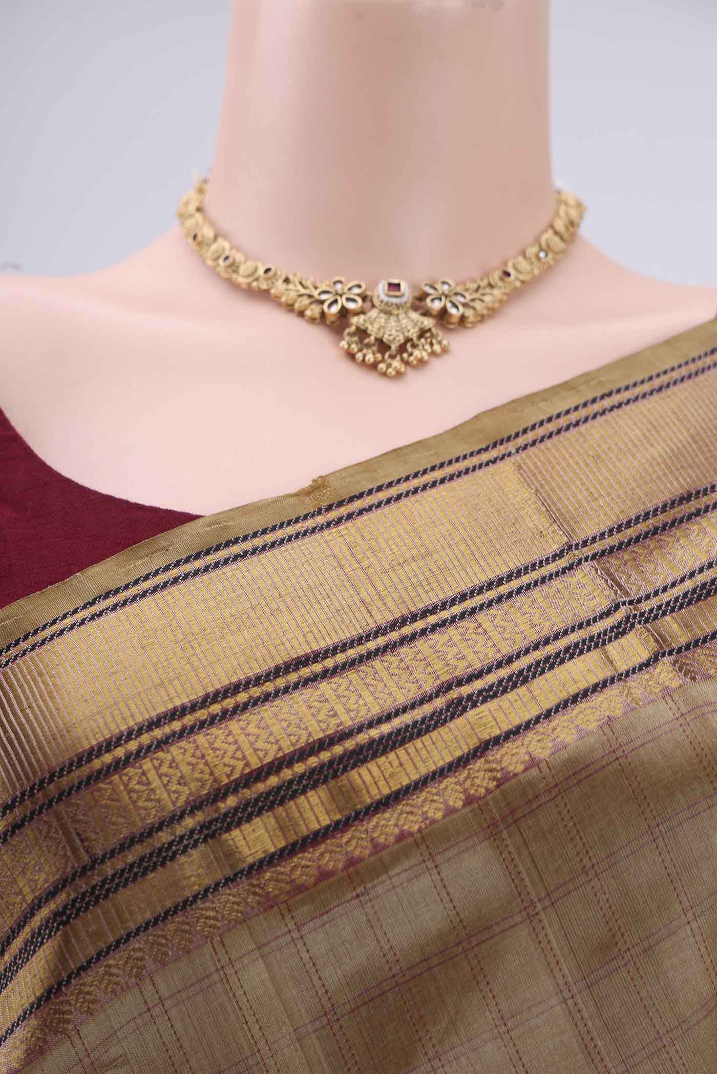 Border image of Dark Beige Coimbatore Silk Cotton Saree with Checked design on the body and Zari And Thread Border. 