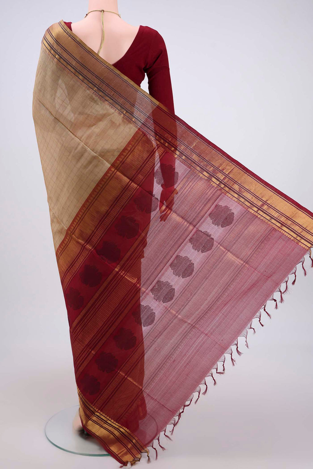 Flat view of Dark Beige Coimbatore Silk Cotton Saree with Checked design on the body and Zari And Thread Border. 
