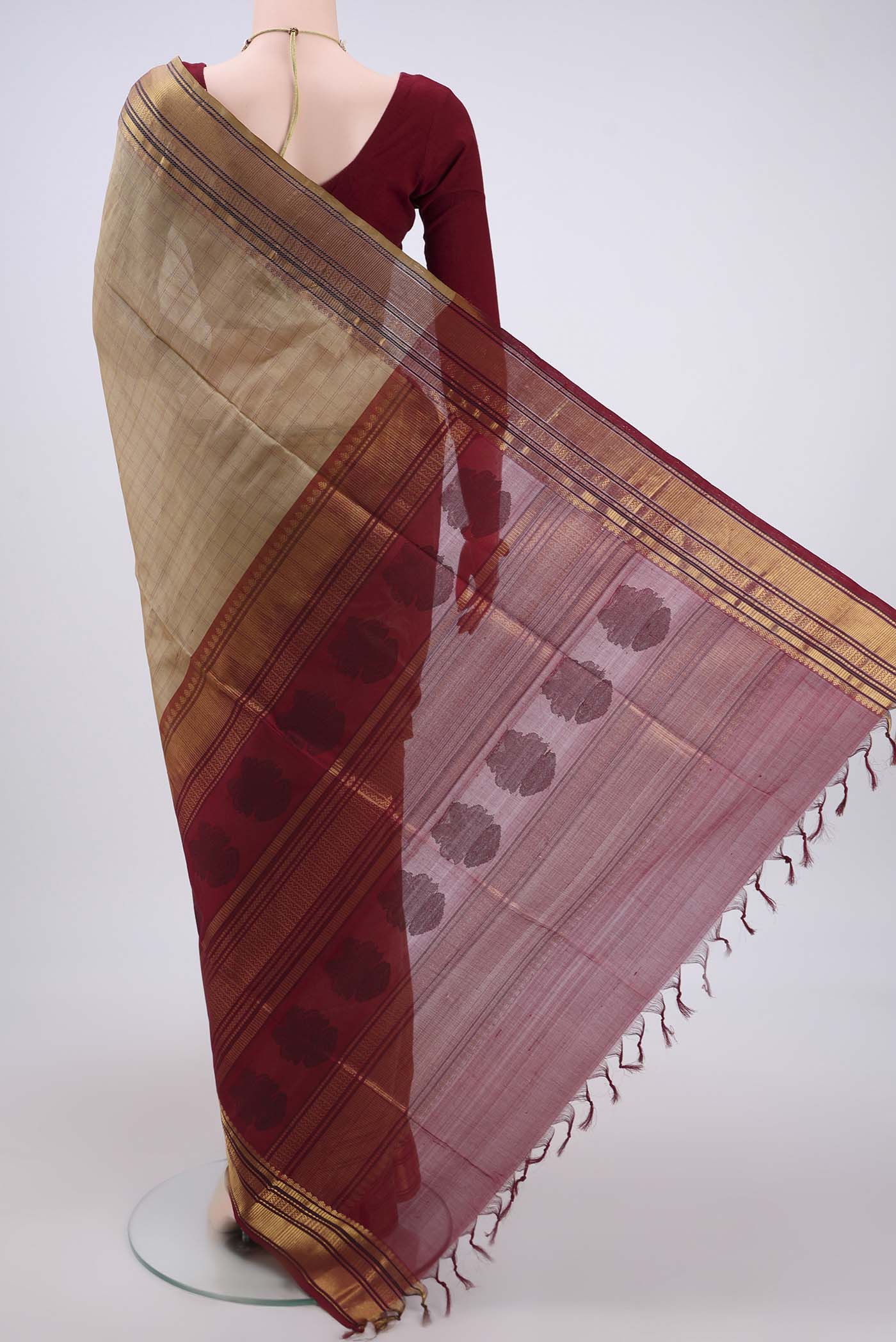 Flat view of Dark Beige Coimbatore Silk Cotton Saree with Checked design on the body and Zari And Thread Border. 
