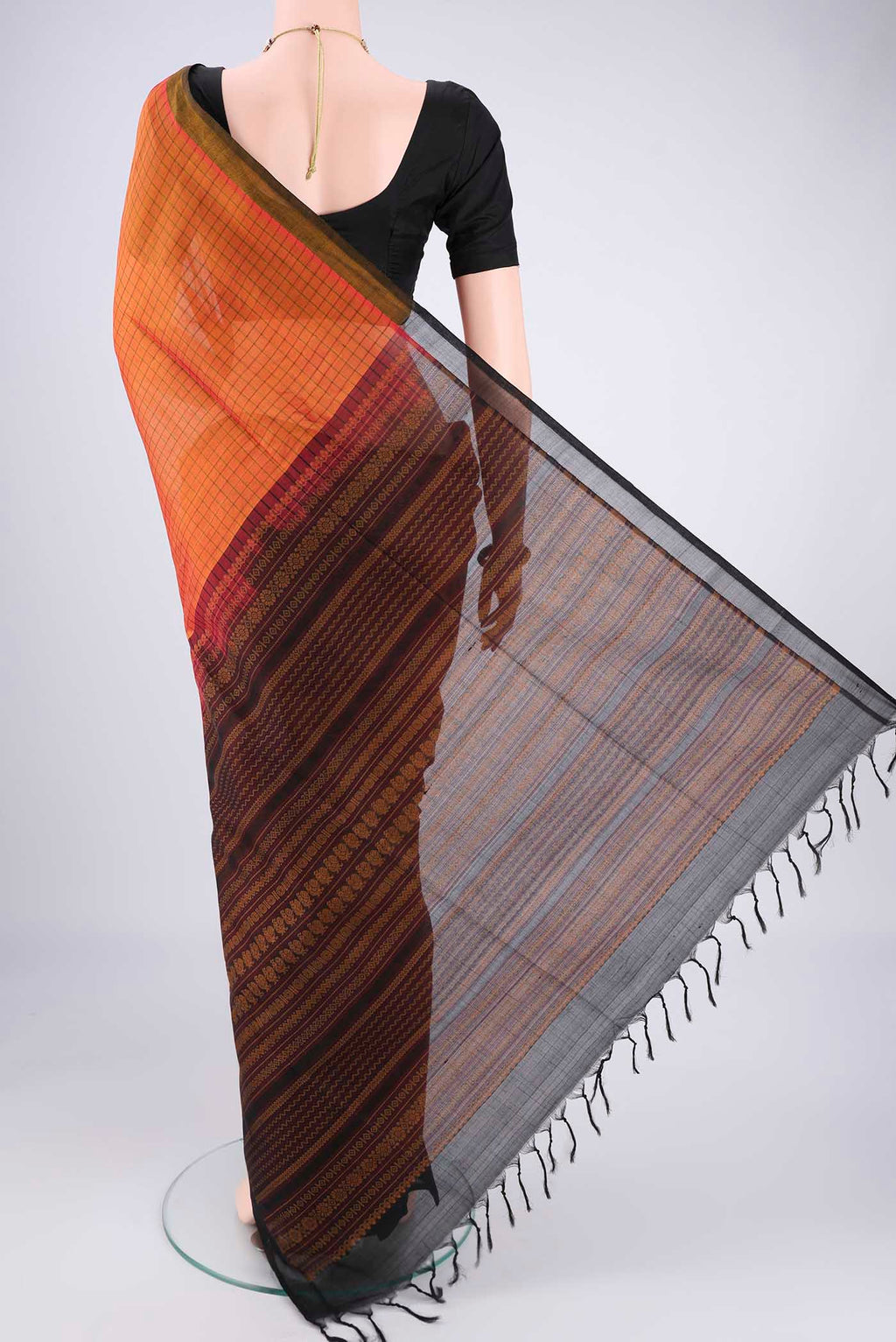 Flat view of Rust Coimbatore Silk Cotton Saree with Checked design on the body and Plain Border. 