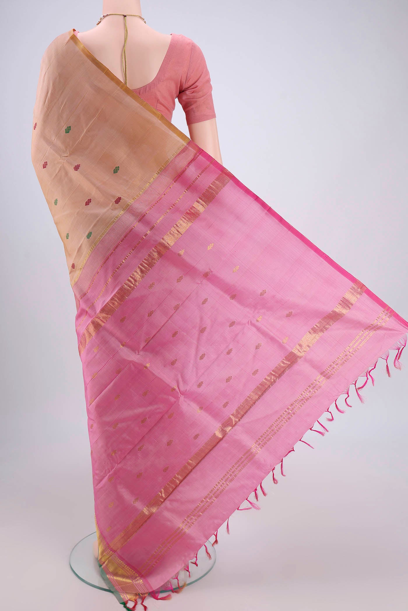 Flat view of Beige Kanjivaram Silk Saree with Thread Butta on the body and One Side Border. 