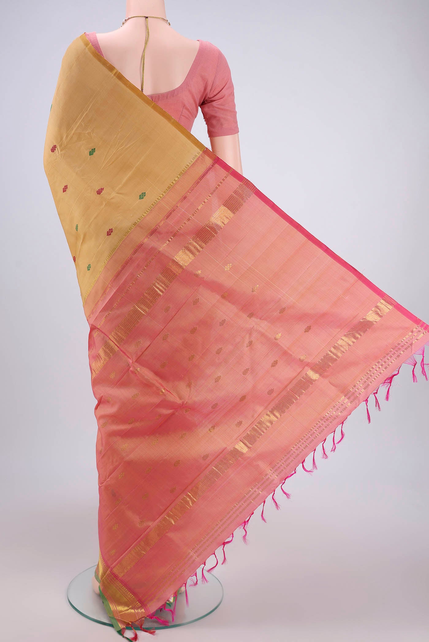 Flat view of Beige Kanjivaram Silk Saree with Thread Butta on the body and One Side Border. 