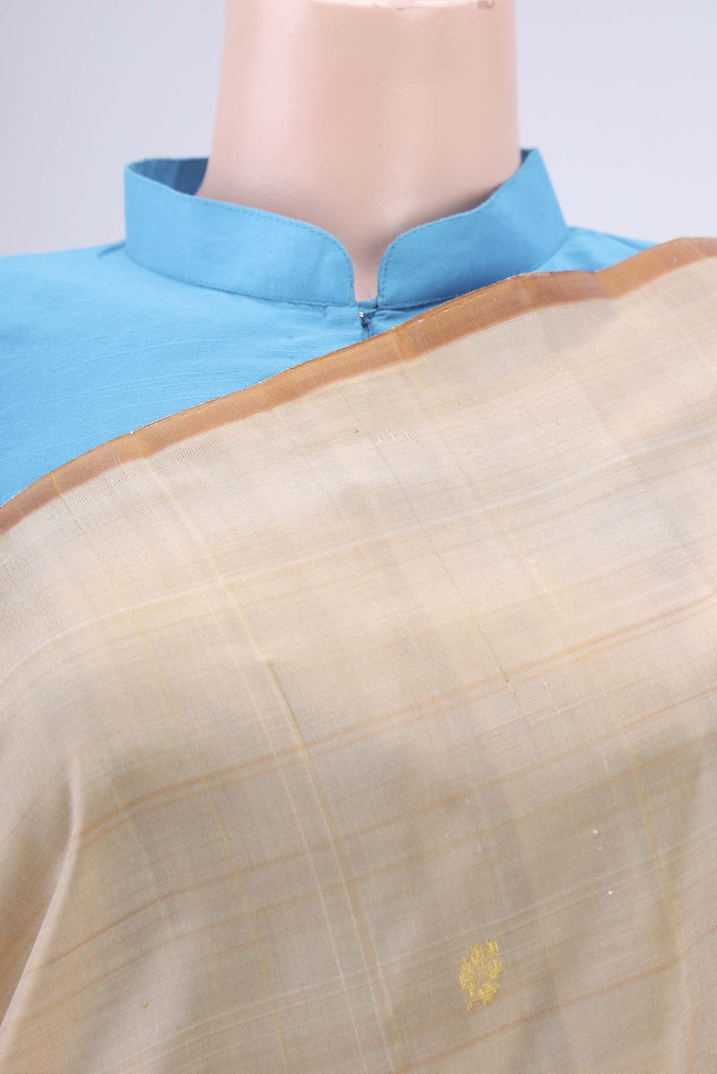 Border image of Cream Kanjivaram Silk Saree with Zari Butta on the body and One Side Border. 