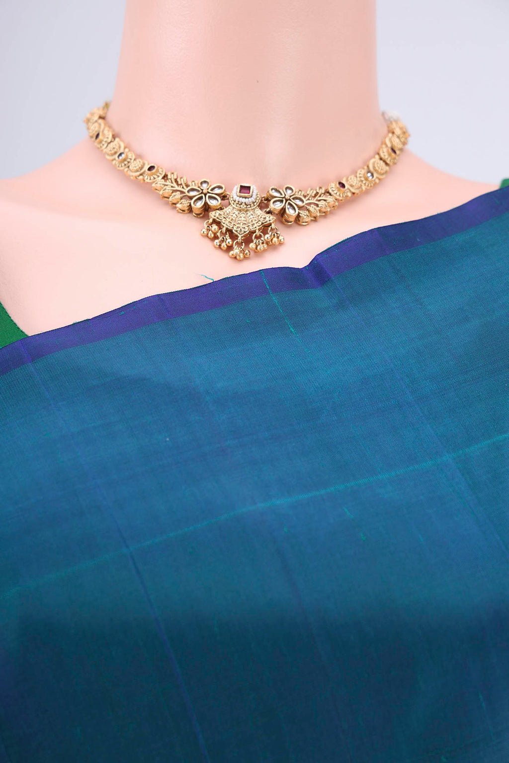 Border image of Peacock Blue Kanjivaram Silk Saree with Zari Butta on the body and One Side Border. 