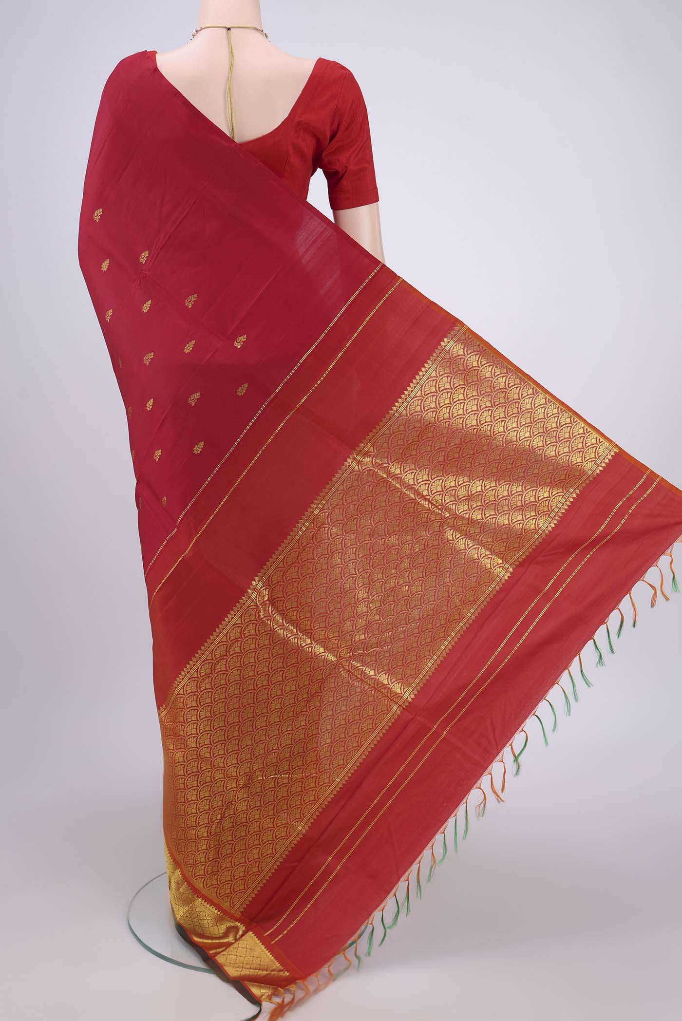 Flat view of Red Kanjivaram Silk Saree with Zari Butta on the body and One Side Border. 