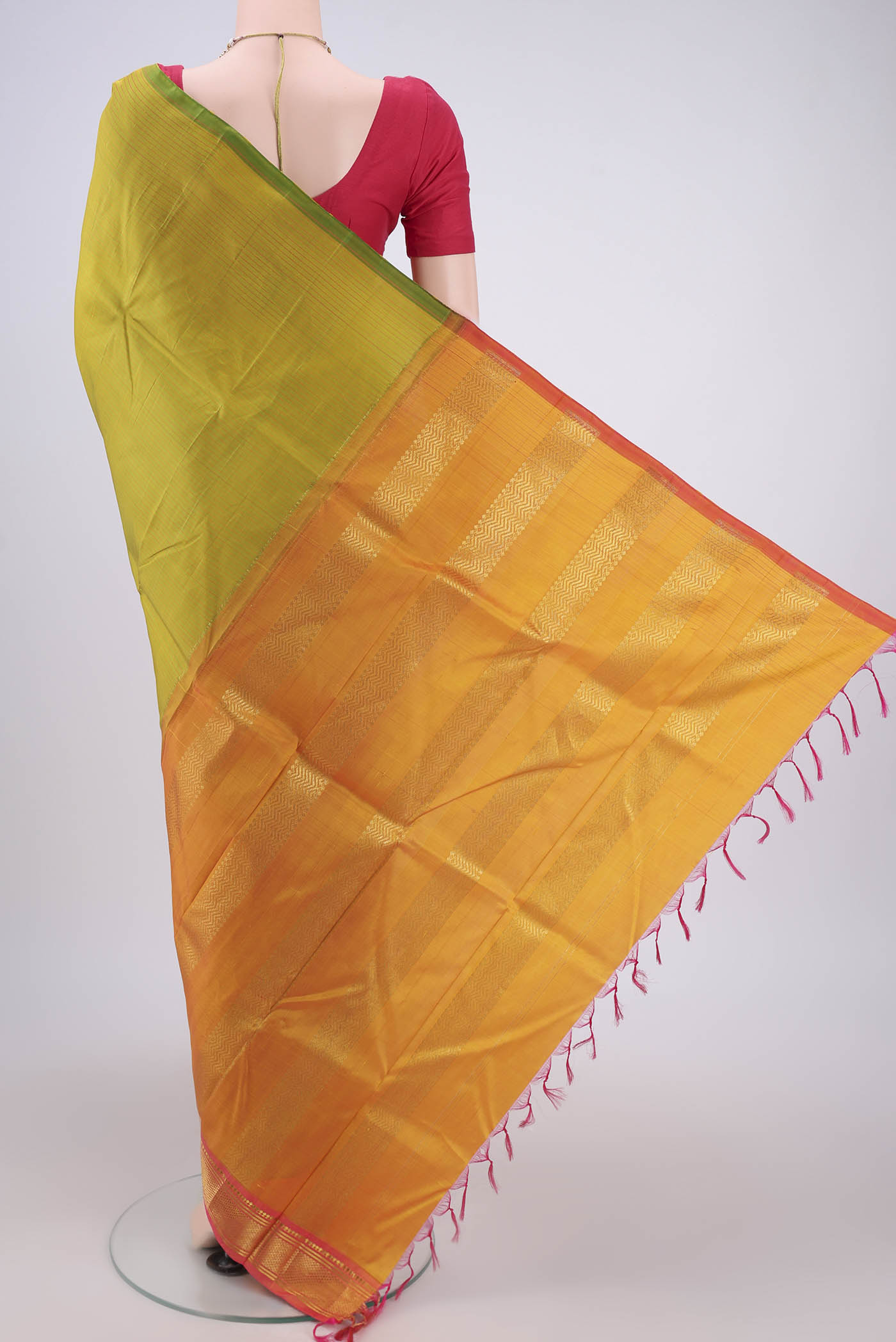 Flat view of Light Green Kanjivaram Silk Saree with Stripes on the body and One Side Border. 