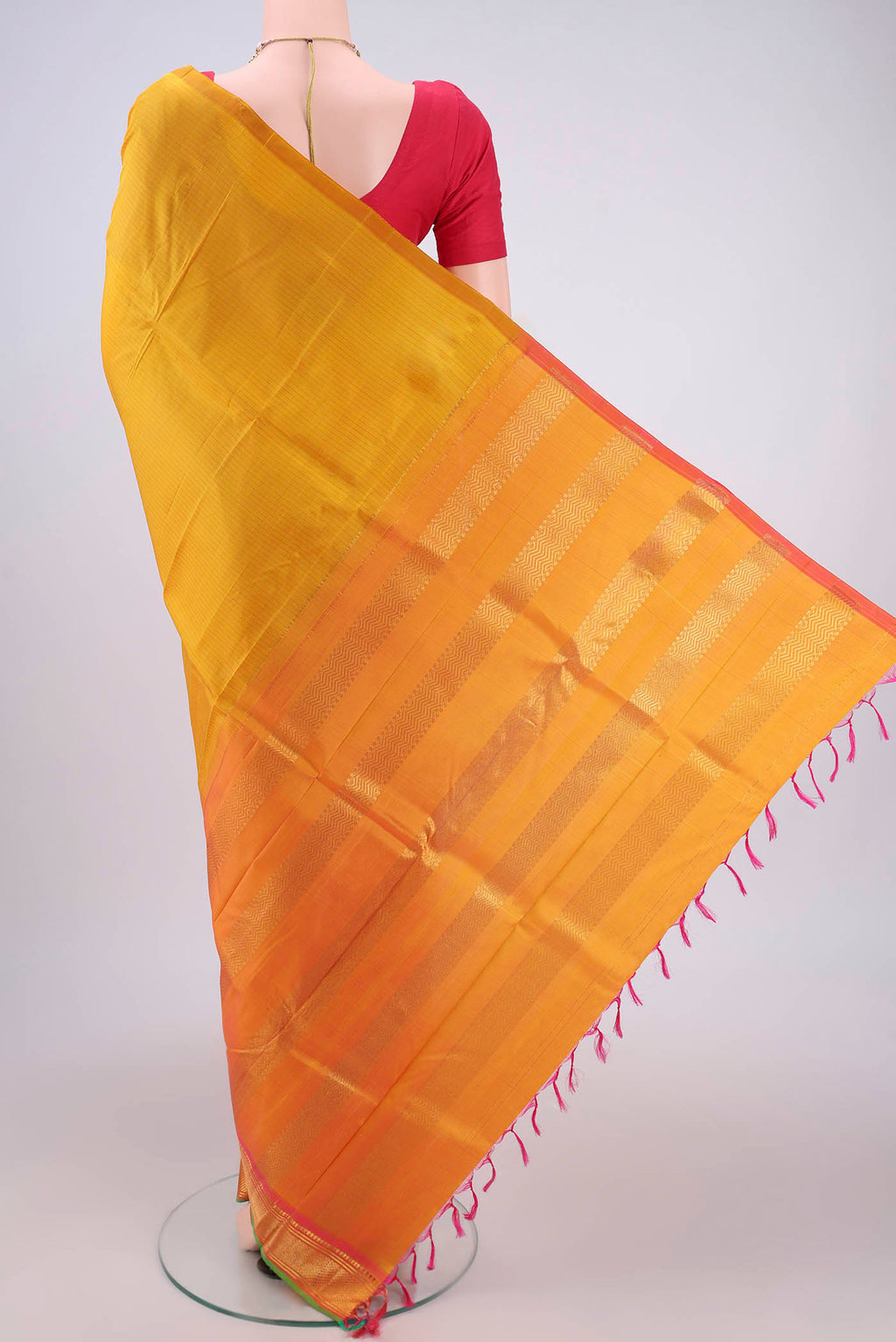 Flat view of Mustard Kanjivaram Silk Saree with Stripes on the body and One Side Border. 