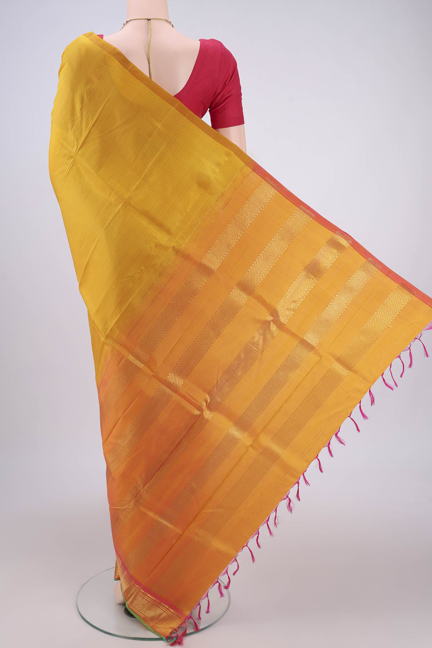Flat view of Mustard Kanjivaram Silk Saree with Stripes on the body and One Side Border. 