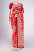 Red Banarasi Georgette Saree with Zari Brocade on the body and Zari Border.  displayed on a mannequin