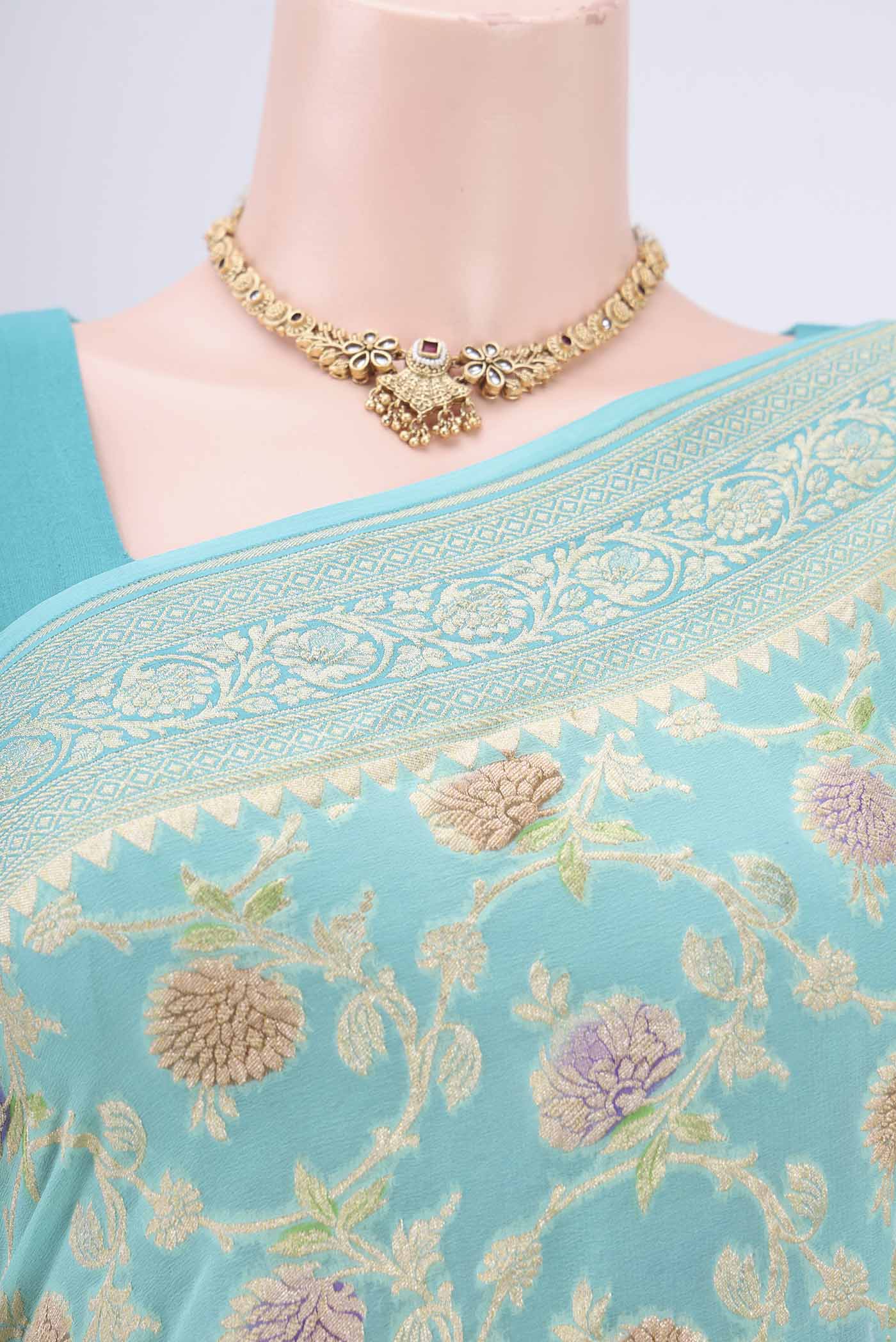 Border image of Sea Green Banarasi Georgette Saree with Zari Brocade on the body and Zari Border. 