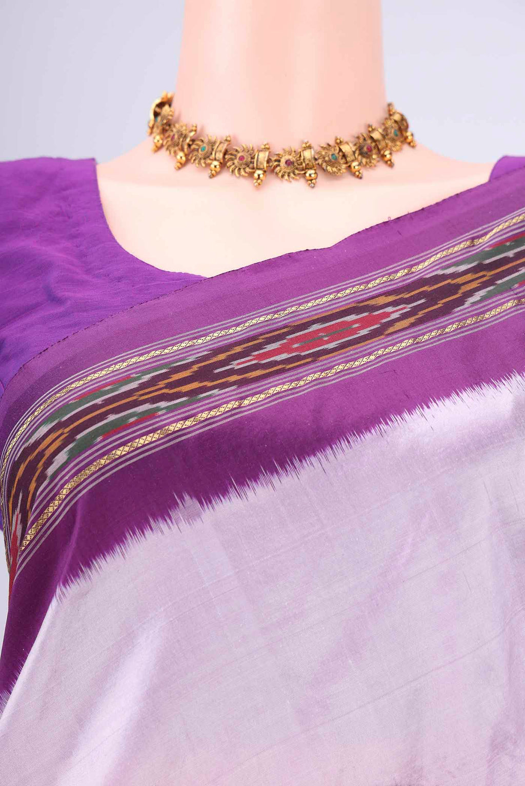 Border image of Lilac Pochampally Silk Saree with Plain Body and Ikat Border. 