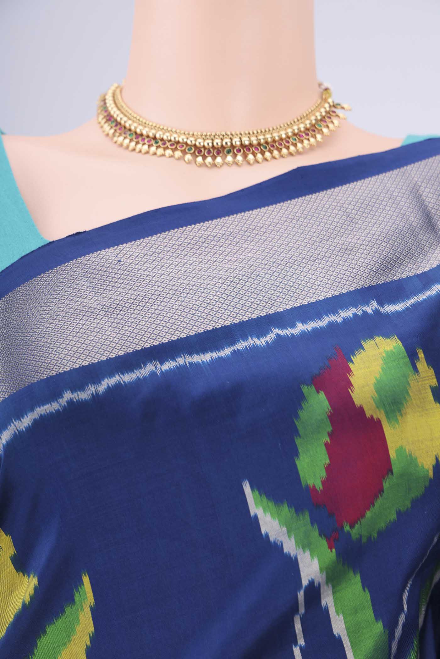 Border image of Blue Pochampally Silk Saree with Pure Ikat on the body and Zari Border. 