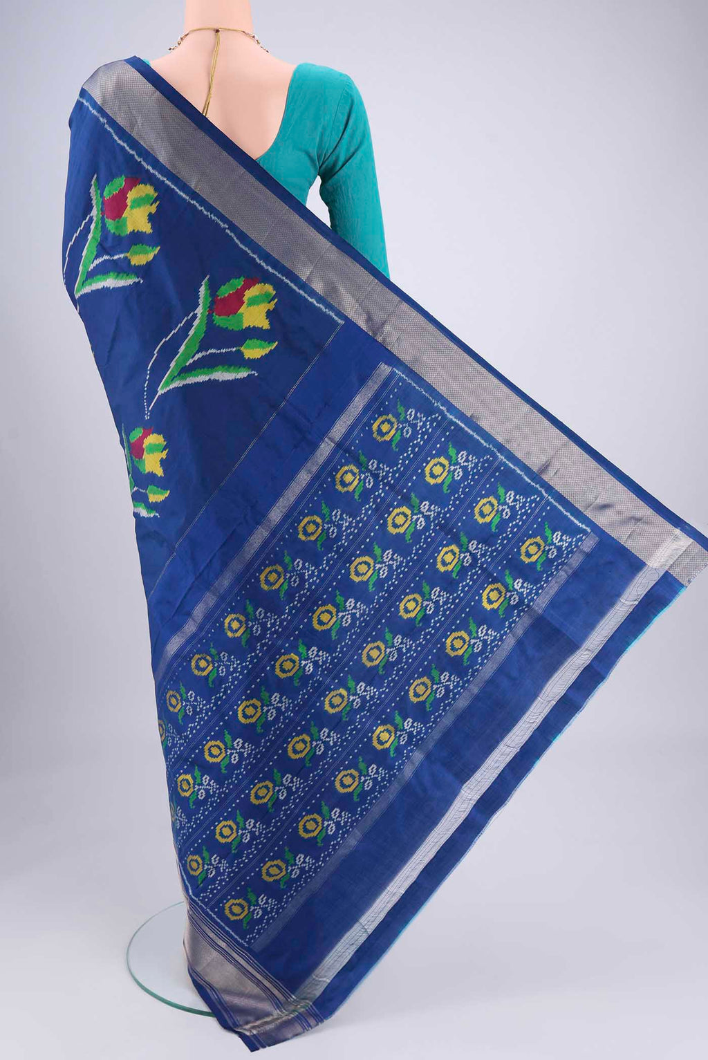Flat view of Blue Pochampally Silk Saree with Pure Ikat on the body and Zari Border. 