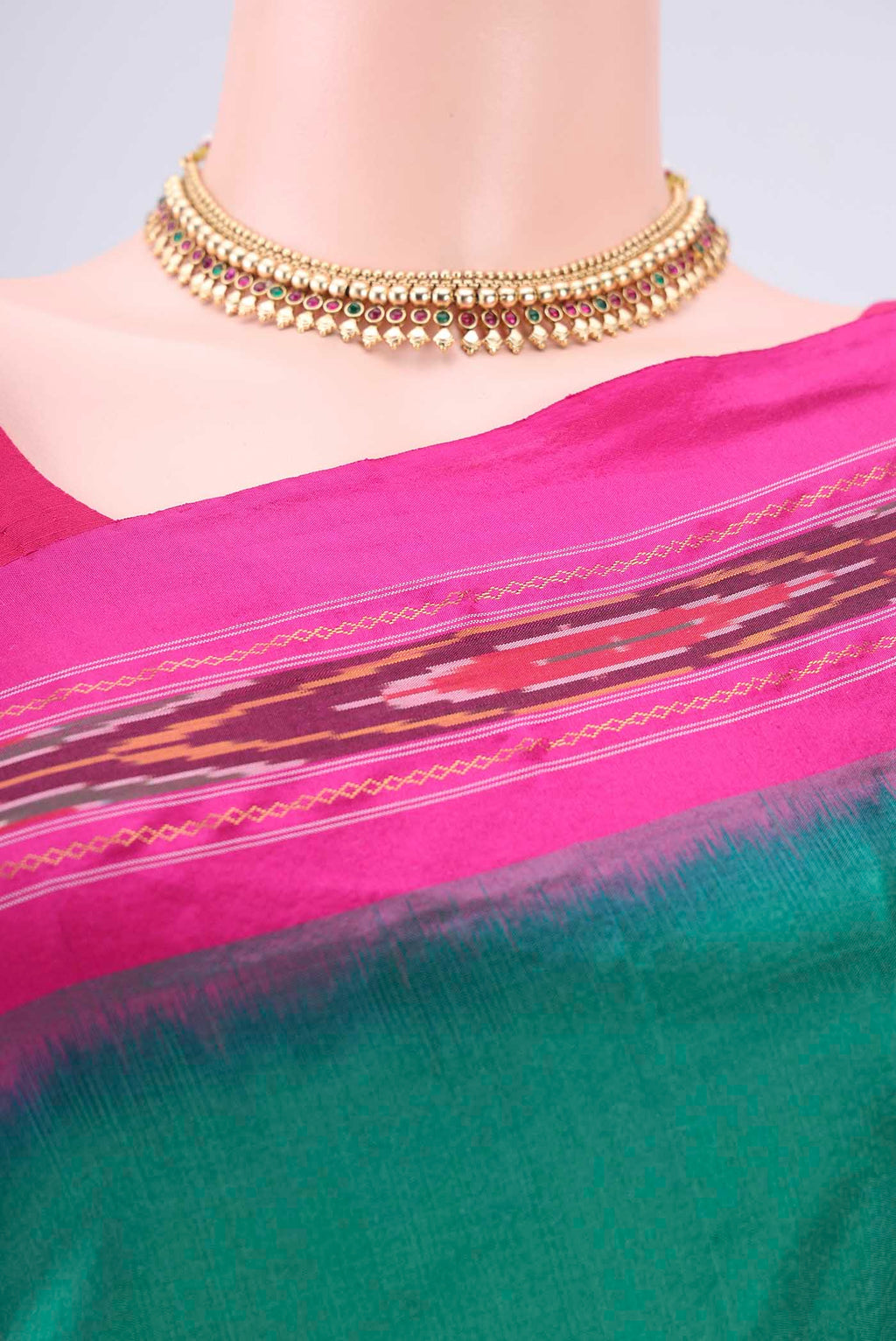 Border image of Green Pochampally Silk Saree with Plain Body and Ikat Border. 