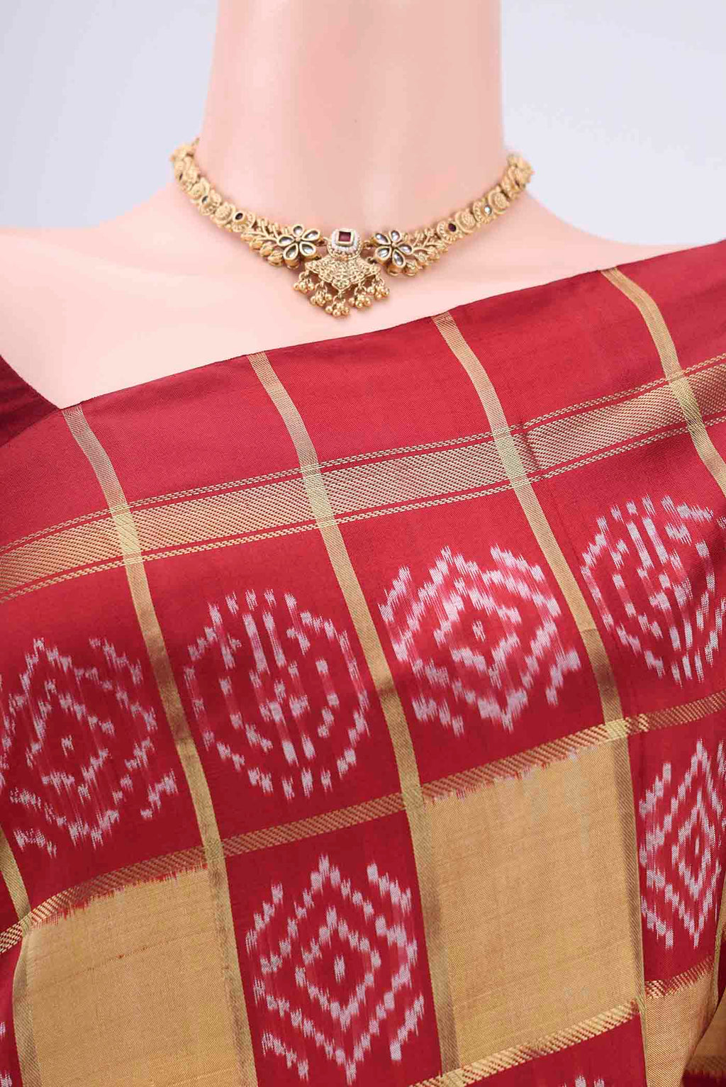 Border image of Peach Pochampally Silk Saree with Checked design on the body and Zari Border. 