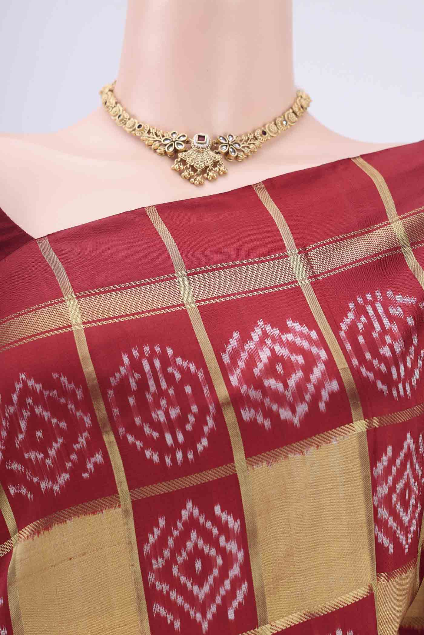 Border image of Peach Pochampally Silk Saree with Checked design on the body and Zari Border. 
