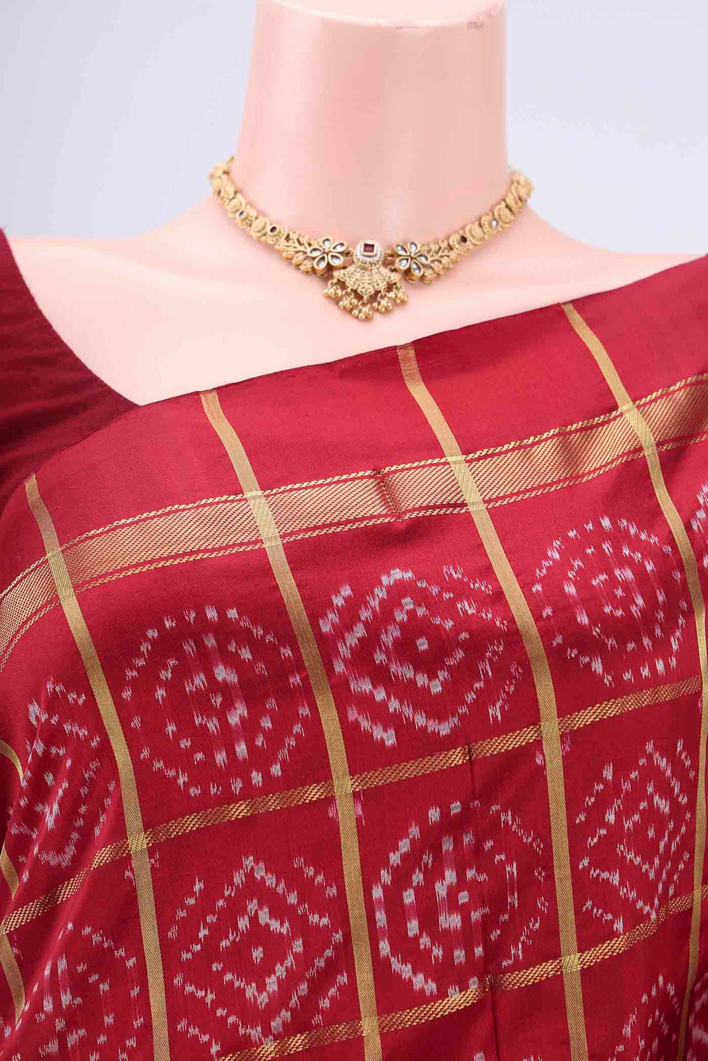 Border image of Maroon Pochampally Silk Saree with Checked design on the body and Zari Border. 