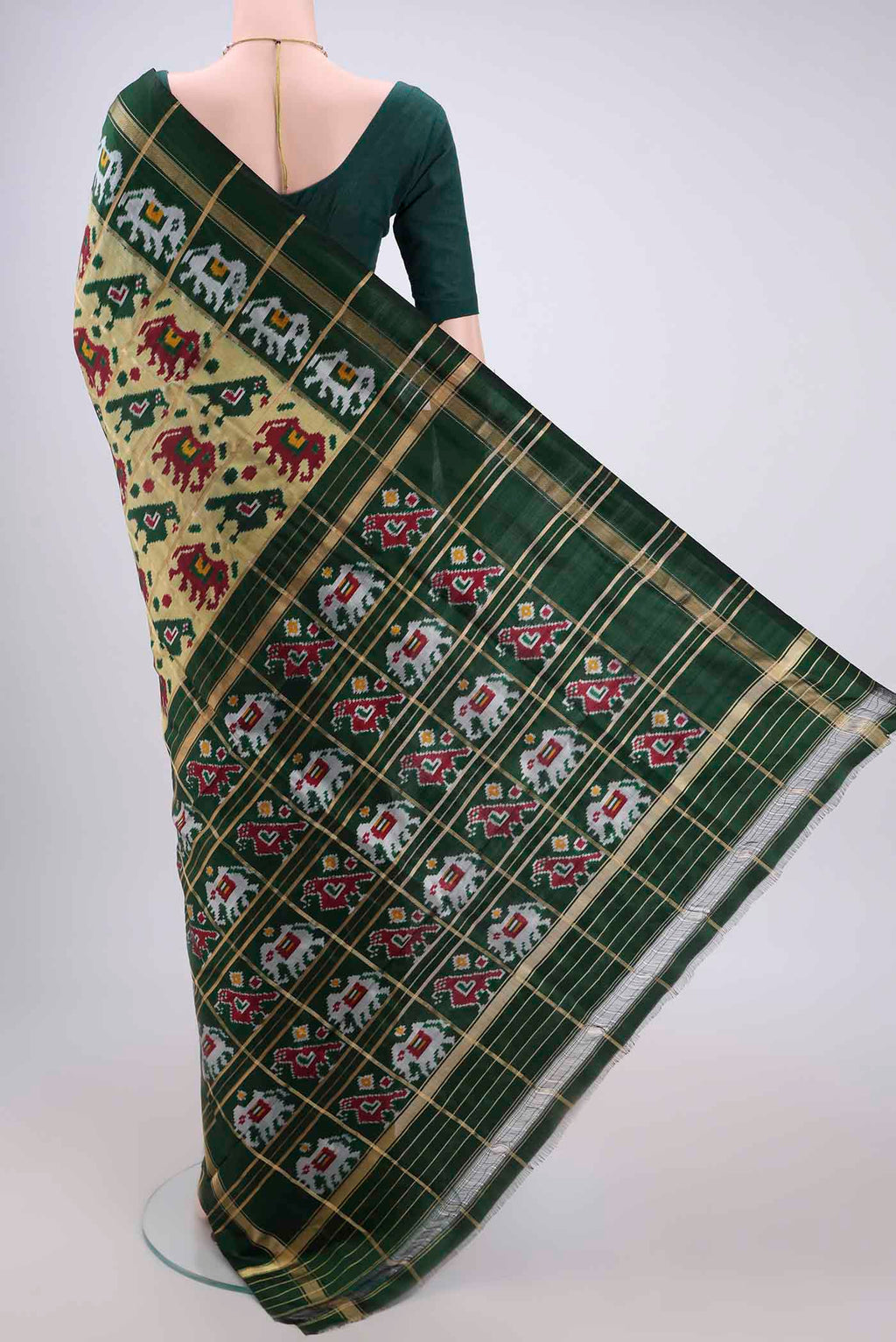 Flat view of Multi Color Pochampally Silk Saree with Checked design on the body and Zari Border. 
