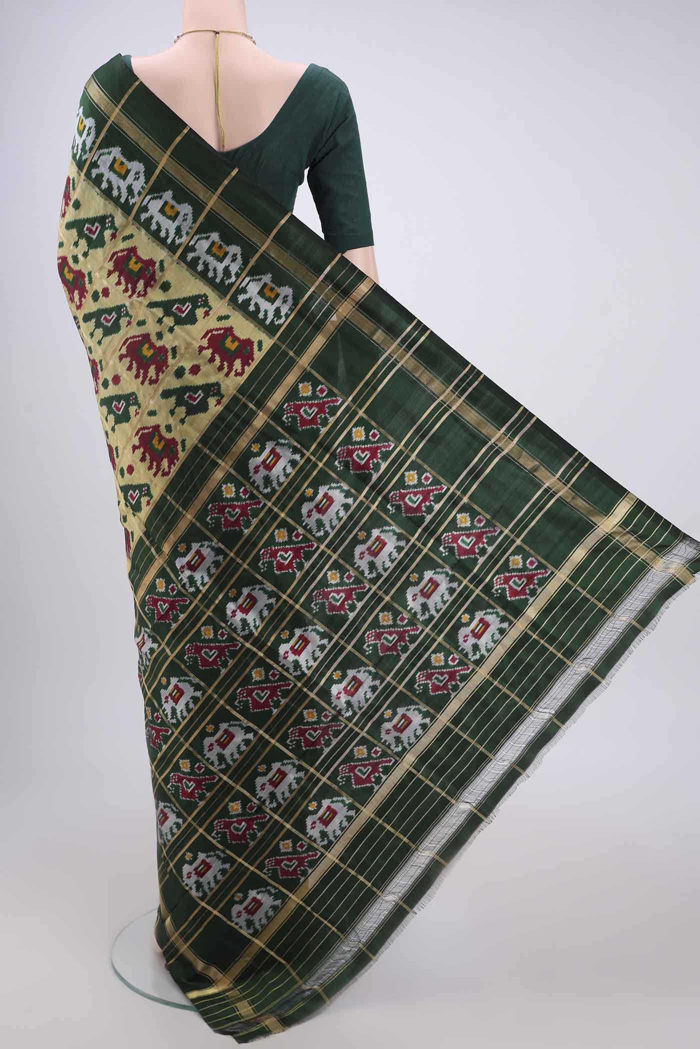 Flat view of Multi Color Pochampally Silk Saree with Checked design on the body and Zari Border. 
